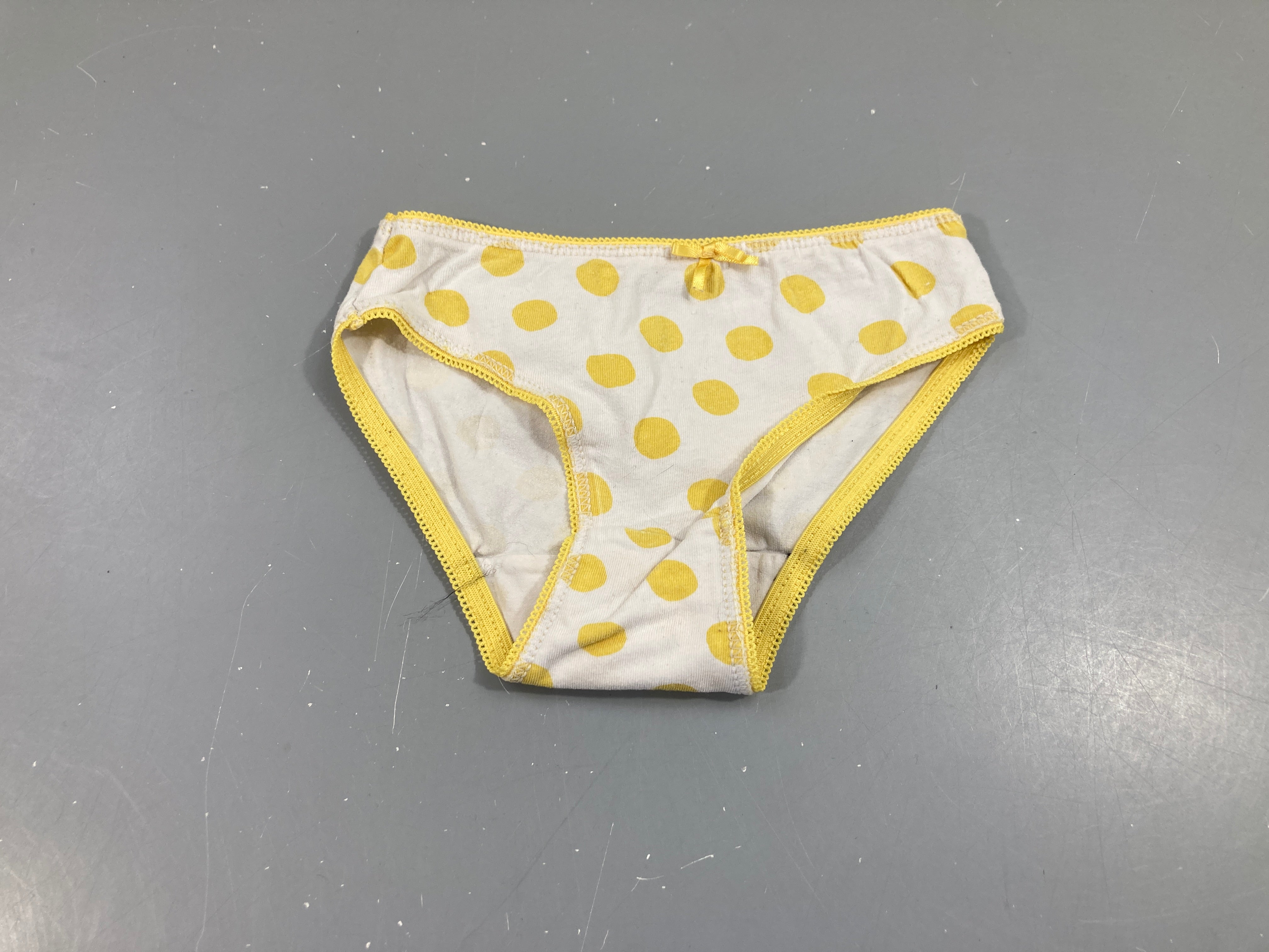 Culotte blanc pois jaunes