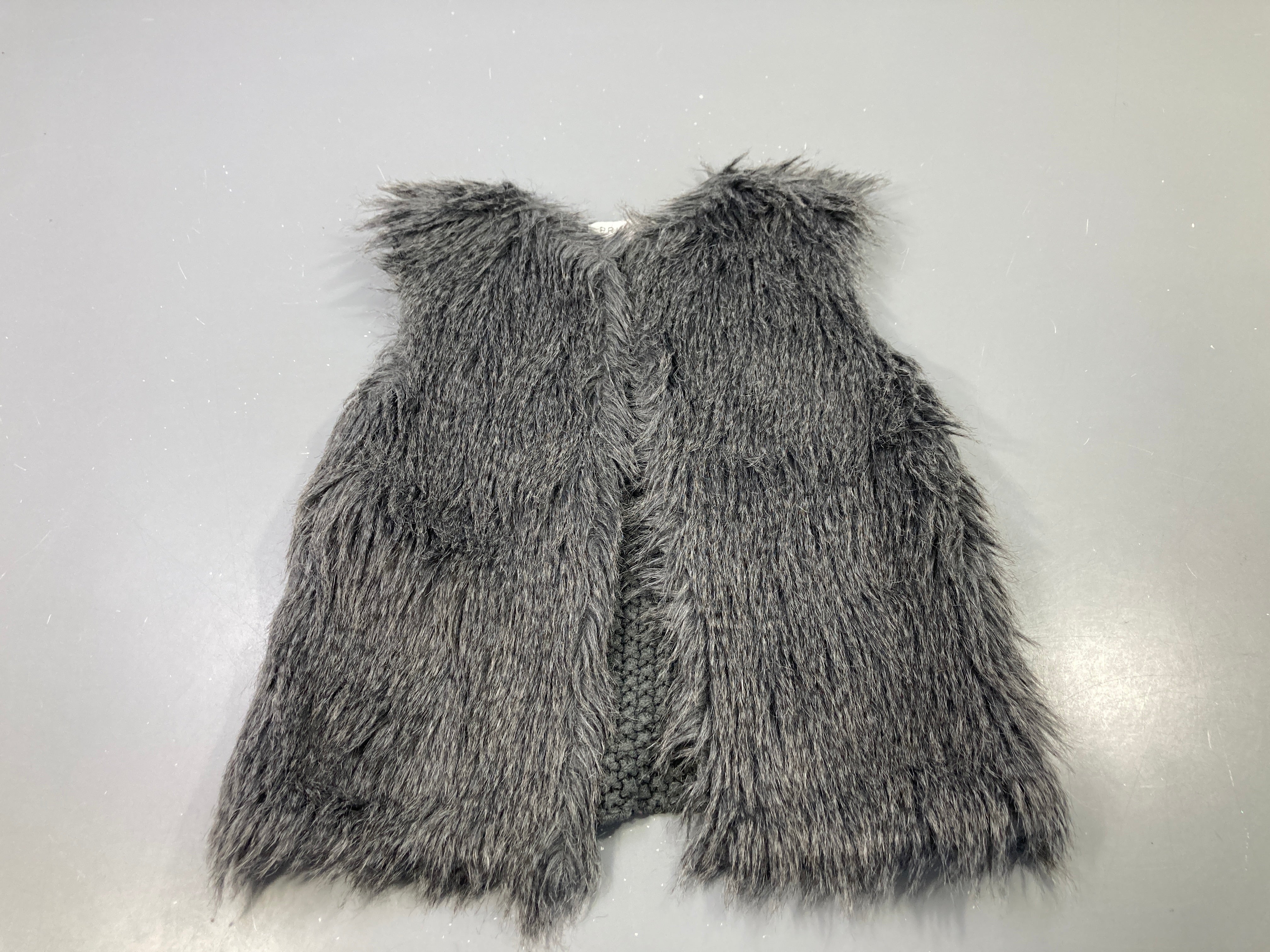Gilet s.m gris fausse fourrure dos mailles