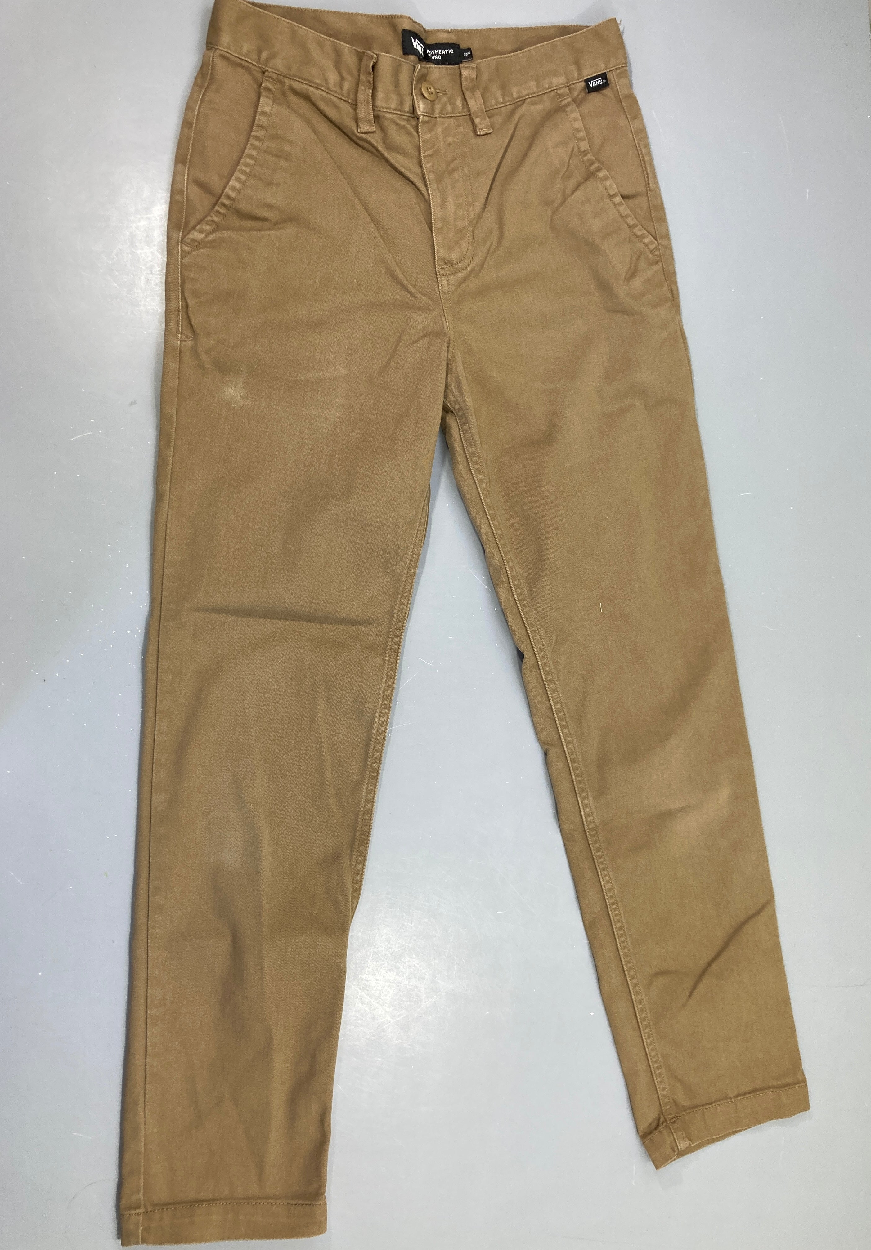 Pantalon chino Vans brun clair légère trace haut jambe droite