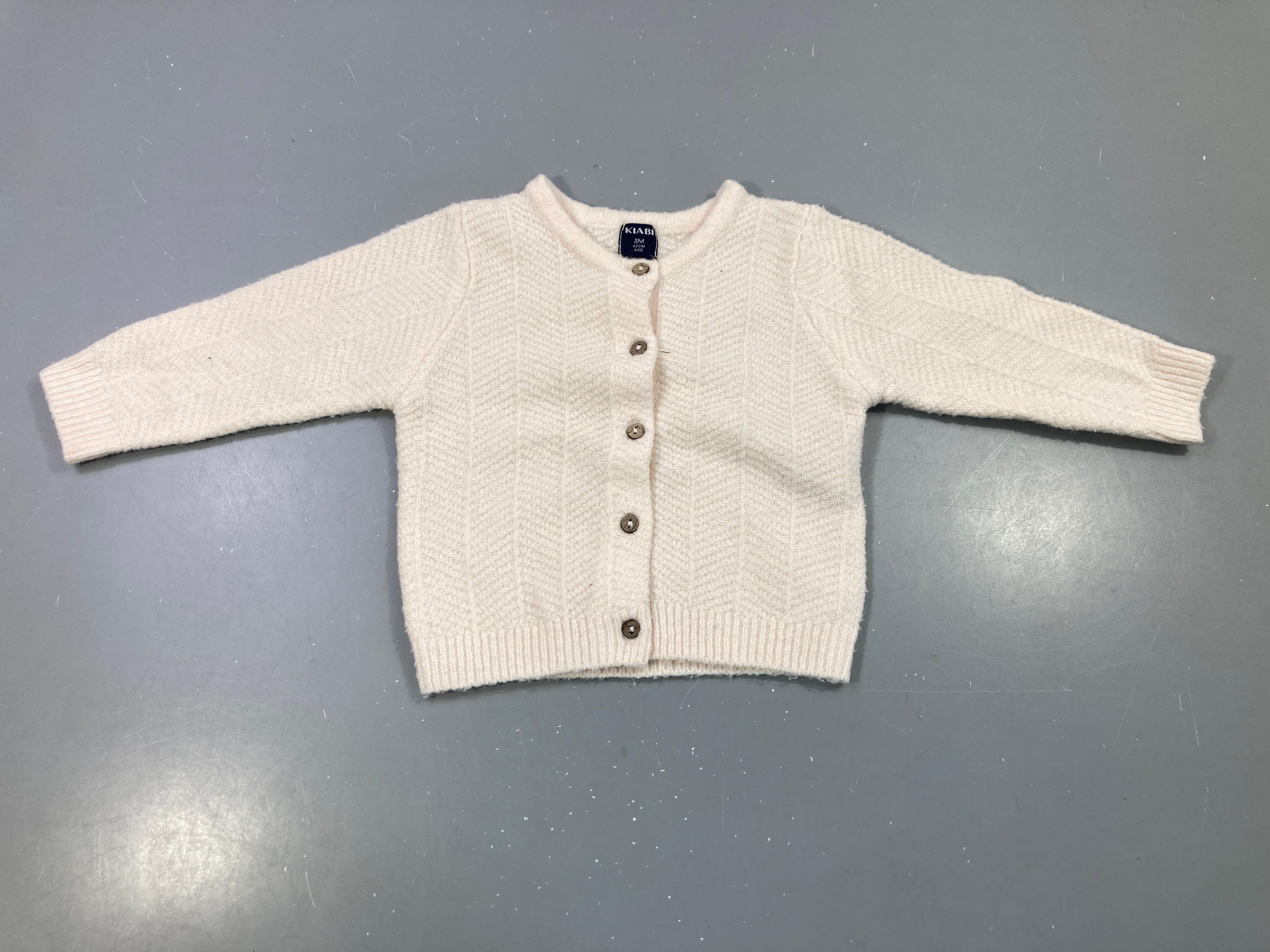 Gilet rose pâle tricot chevrons