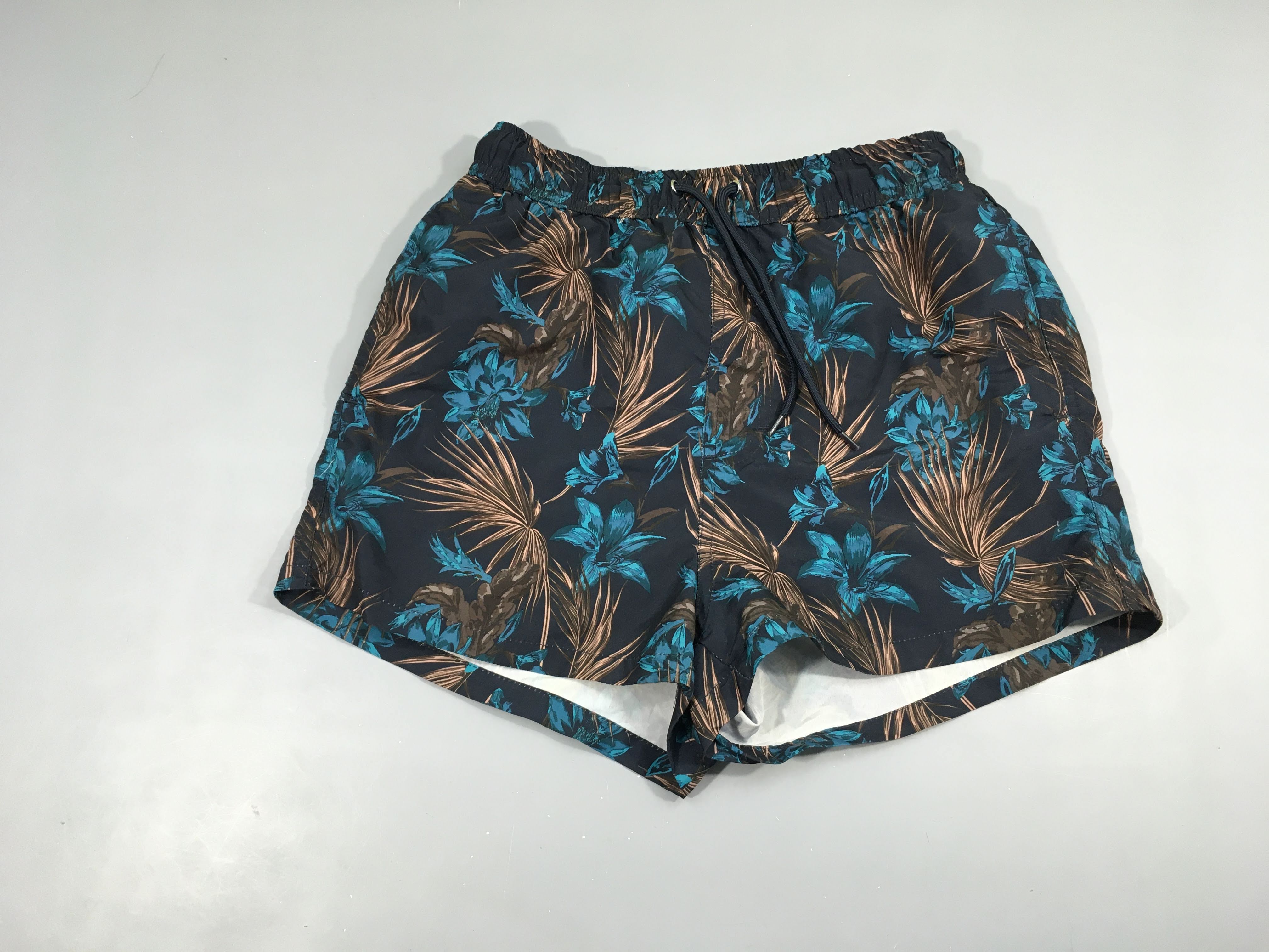 Maillot short bleu foncé feuillage bleu brun