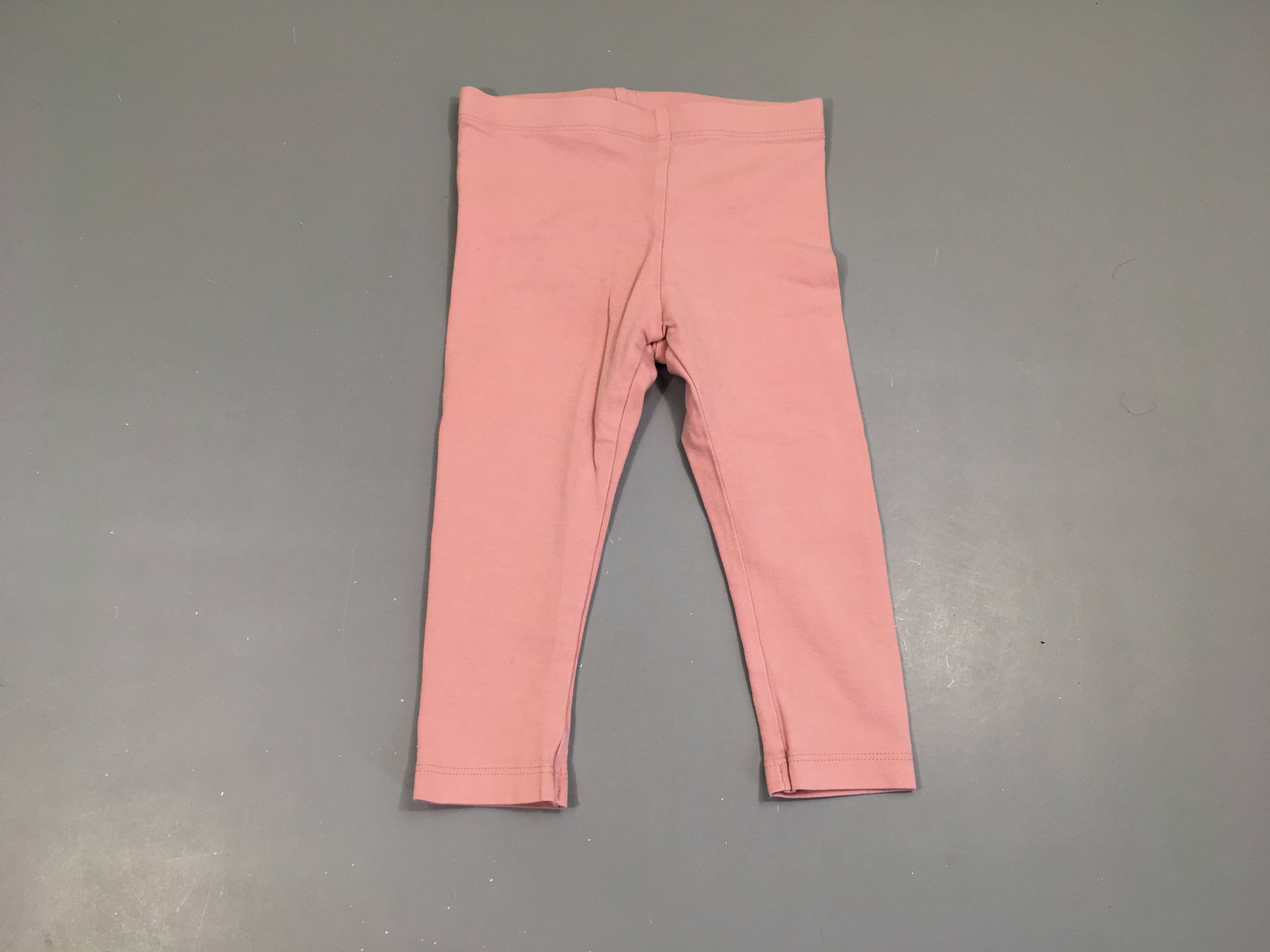 Legging rose, légèrement bouloché