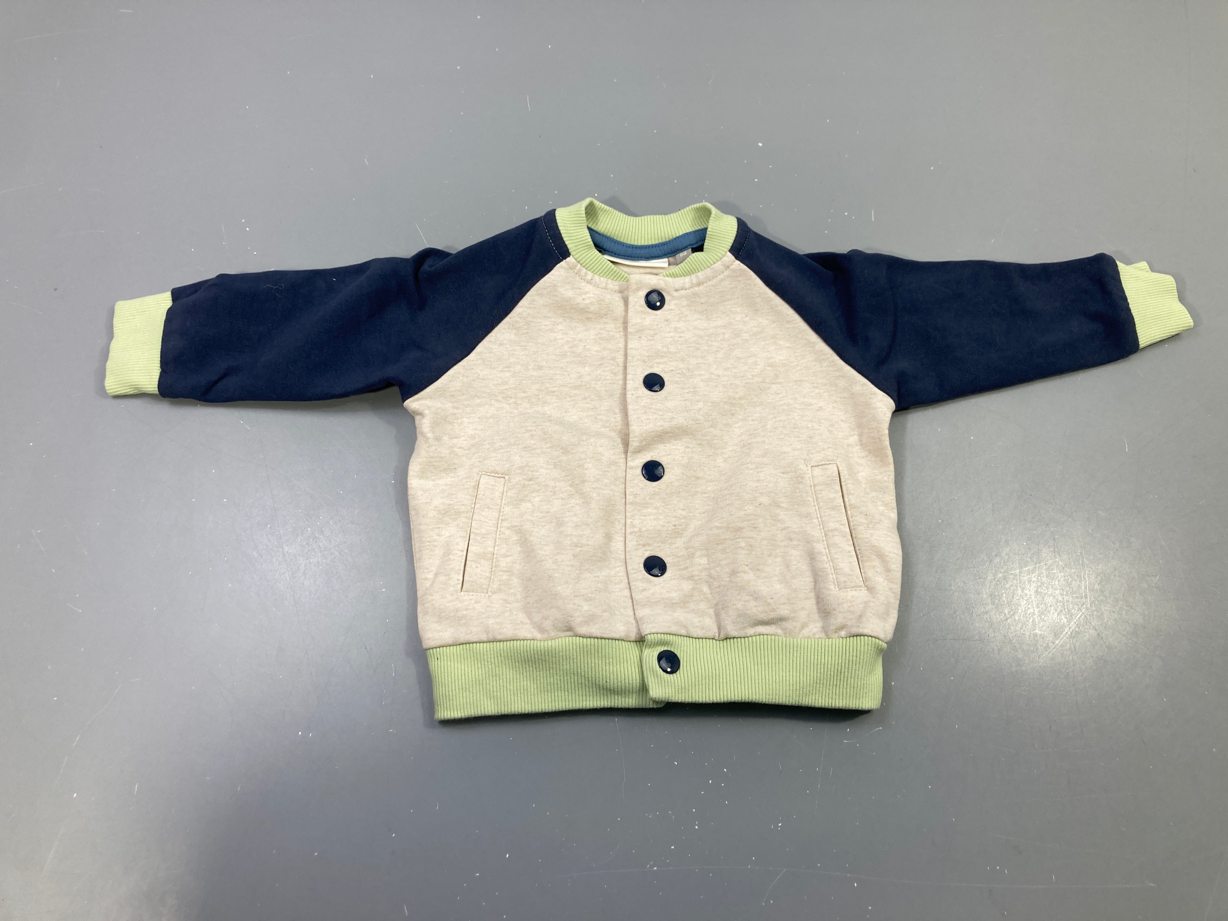 Gilet bomber écru chiné manches marine, bords verts