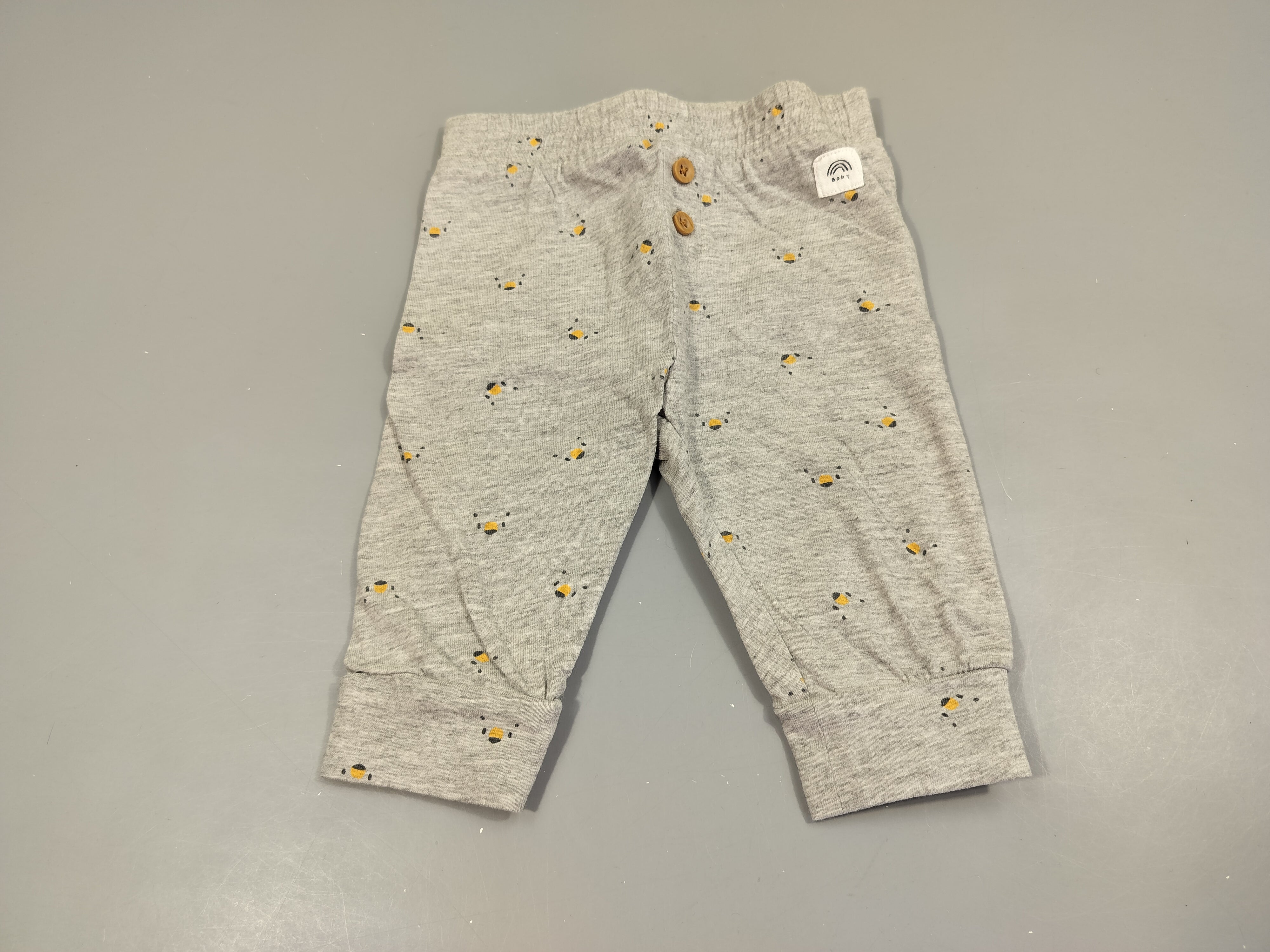 Pantalon gris clair flammé taille et chevilles élastiques à motifs  95% coton 5% viscose