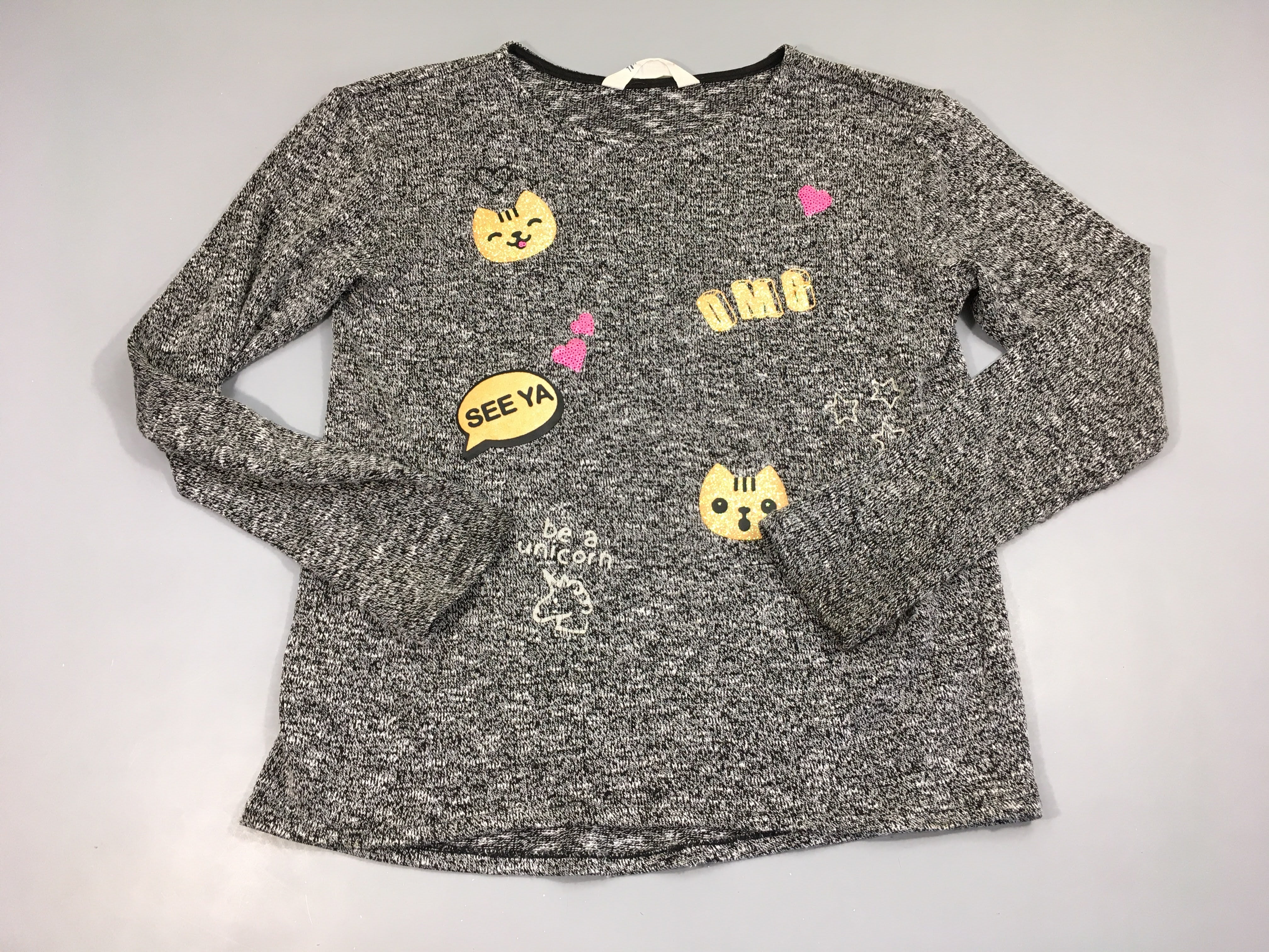 Pull maille noir chiné blanc OMG