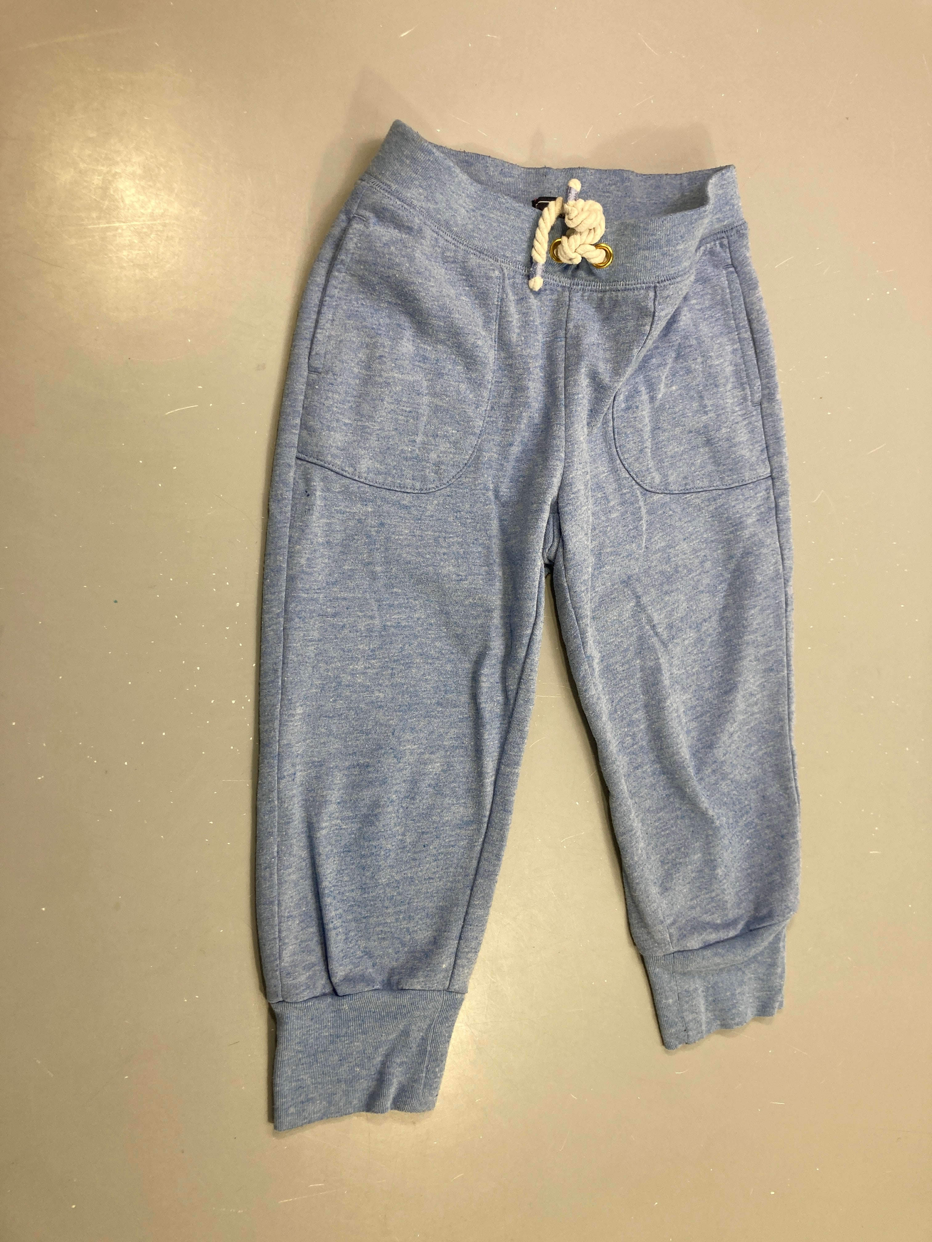 Jogging bleu chiné cordon doré poches