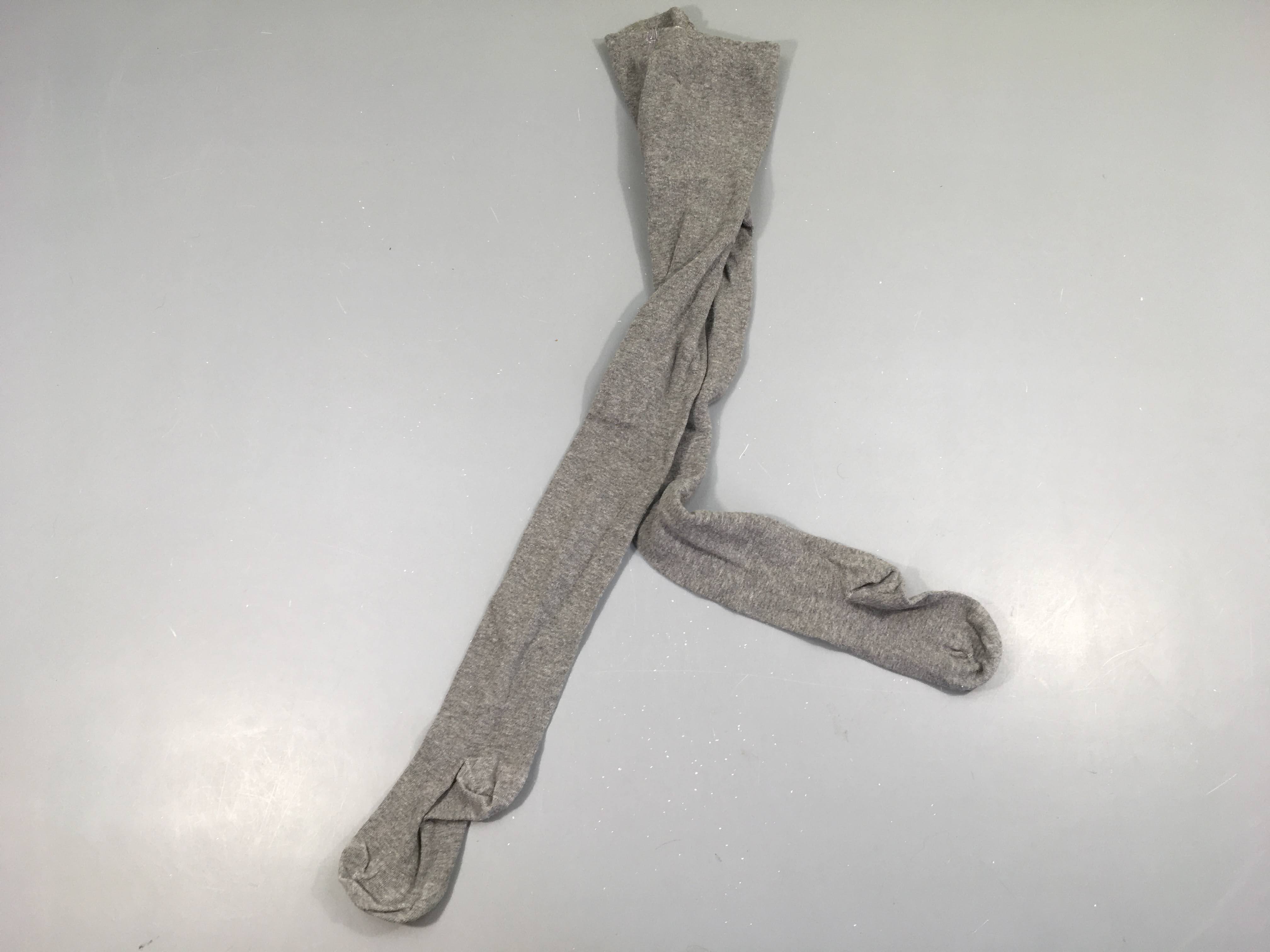 Collants gris clair Taille estimée