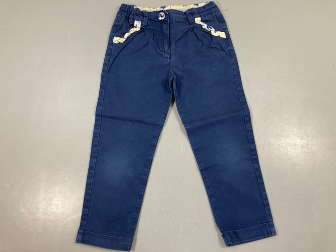 Pantalon bleu bouton fleuri Légèrement délavé coutures, moins cher chez Petit Kiwi