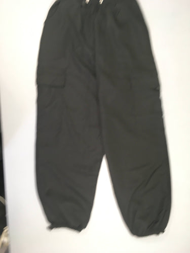Pantalon noir fluide taille et chevilles élastiques, moins cher chez Petit Kiwi