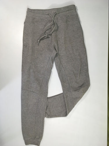 Pantalon de Jogging gris texturé poche zip arrière légèrement bouloché, moins cher chez Petit Kiwi