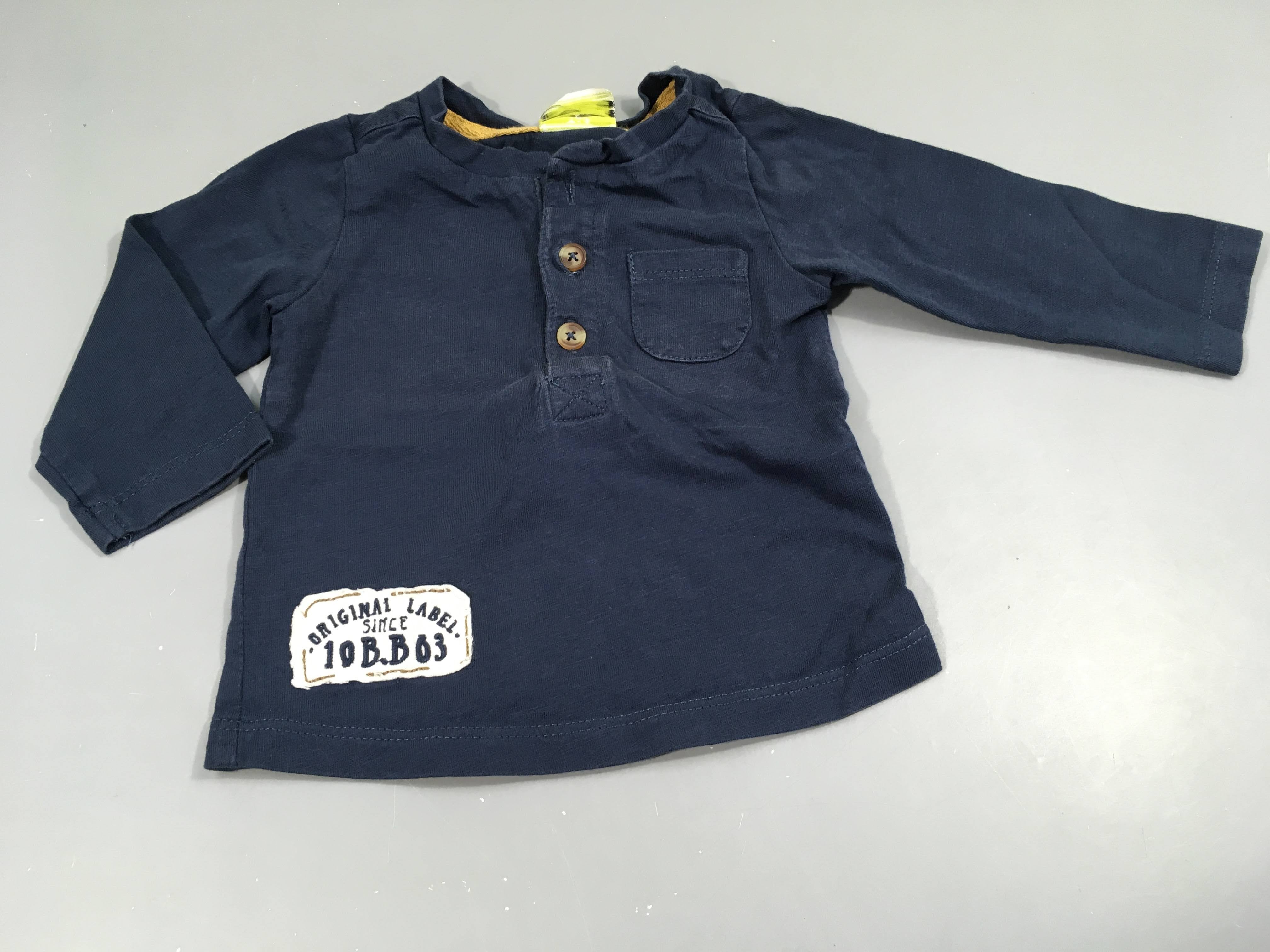 T-shirt m.l , écusson blanc