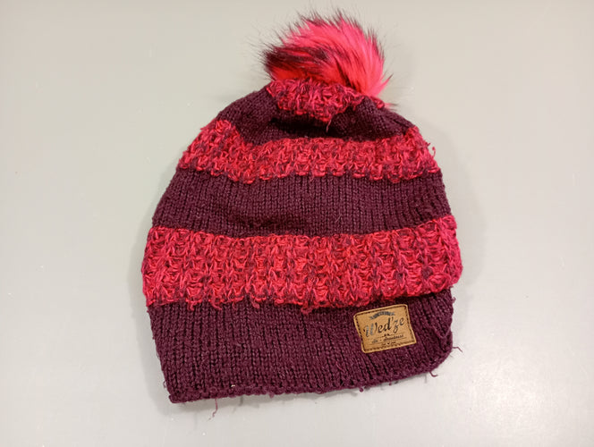Bonnet Wed'ze tricot rose et bordea avec pompon, un peu bouloché, moins cher chez Petit Kiwi
