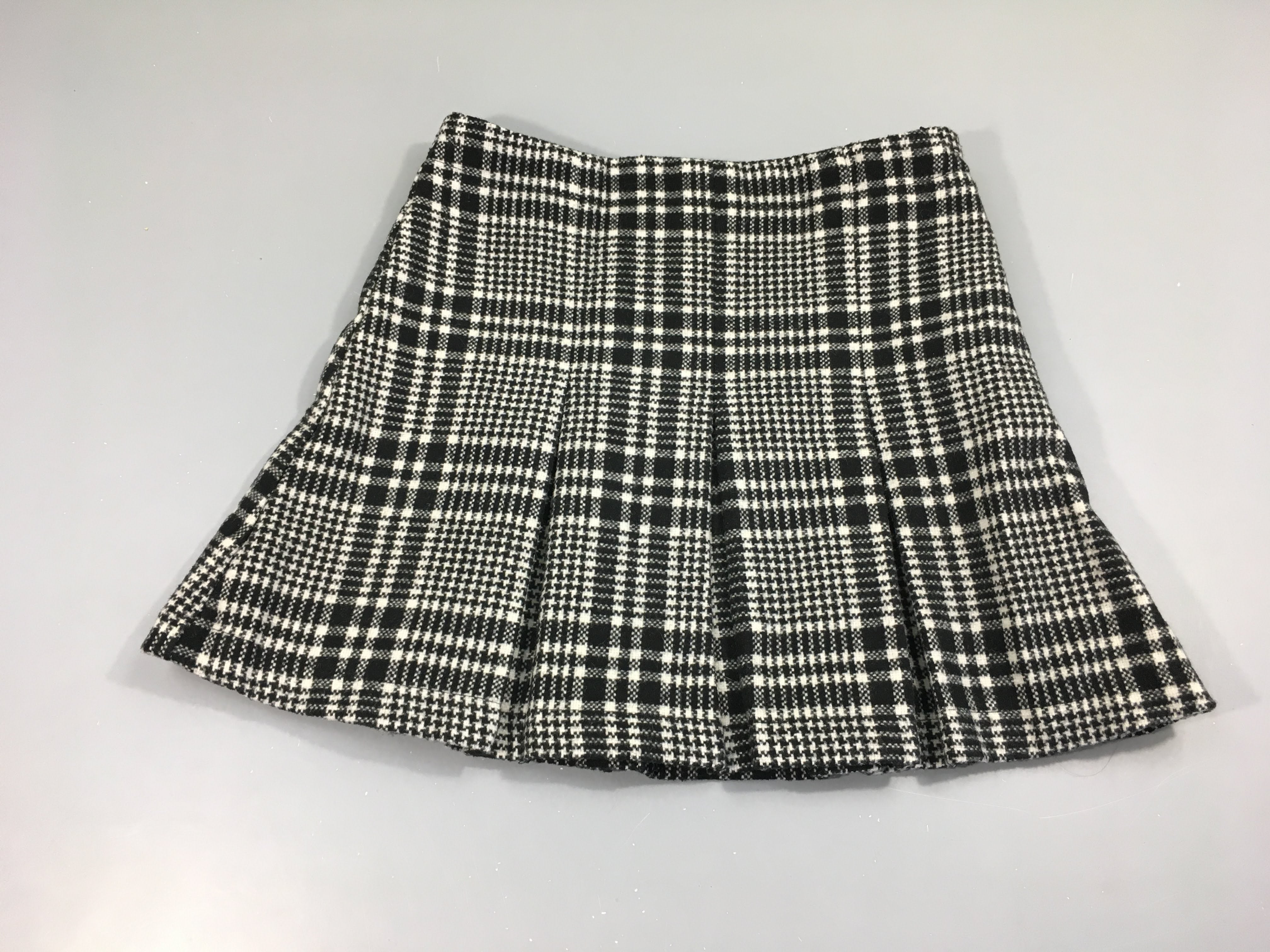 Jupe style tweed à carreaux noir blanc