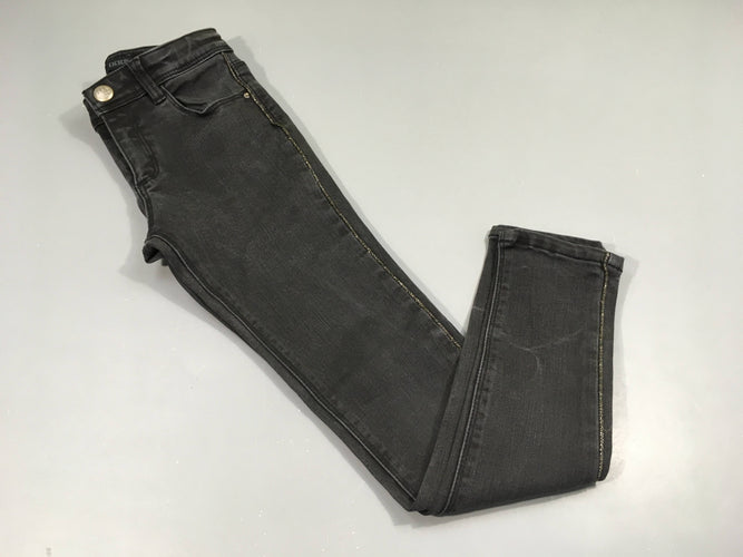 Pantalon denim noir  skinny , fines bandes latérales argentées, pas de taille indiquée, estimée 8a, moins cher chez Petit Kiwi