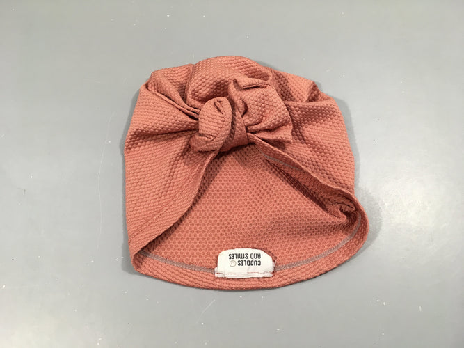 Bonnet de bain, vieux rose texturé avec noeud. Prot.ection 50+, moins cher chez Petit Kiwi