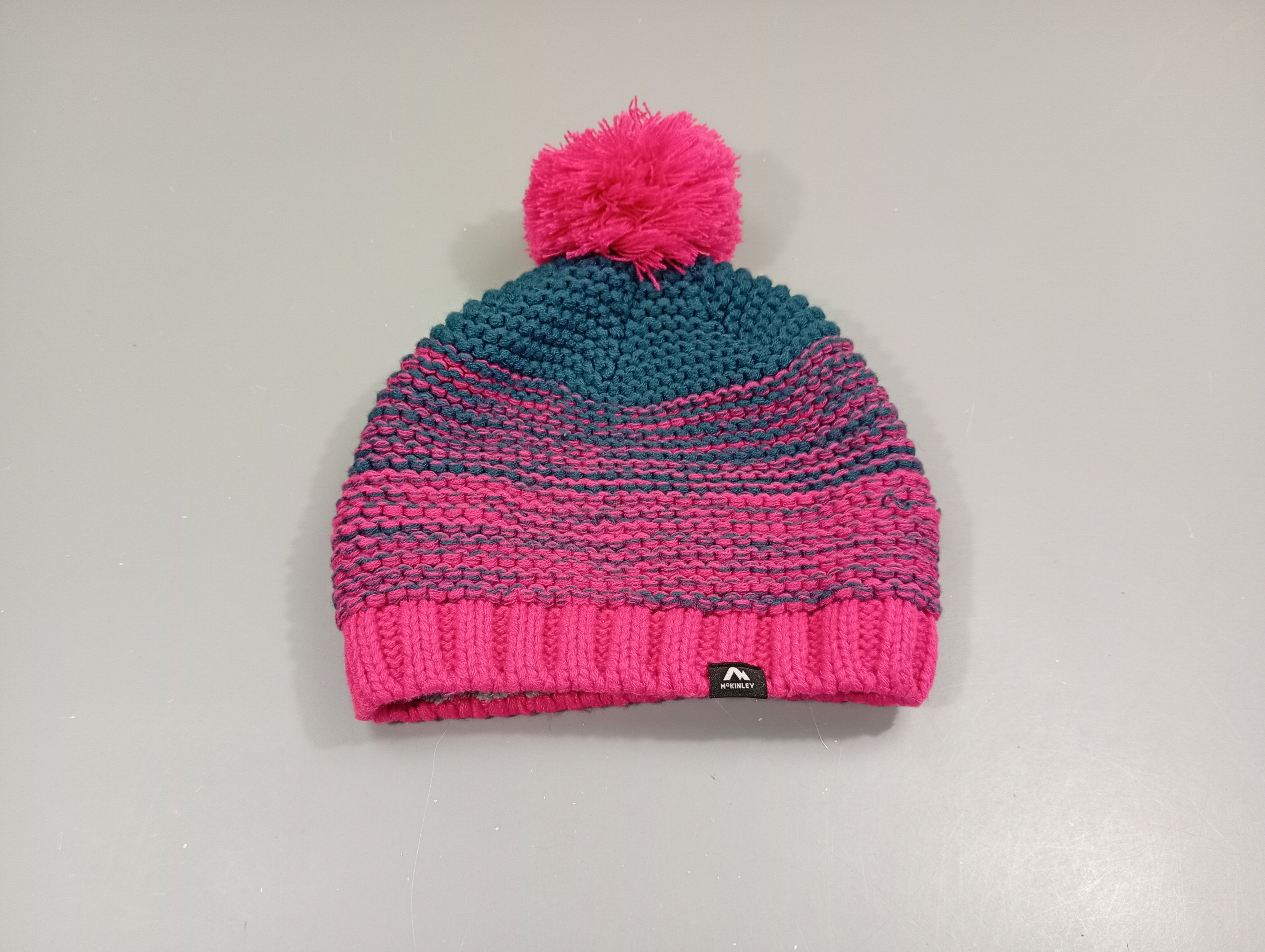 Bonnet Mc Kinley tricot chiné rose et bleu avec pompon  52-54 cm