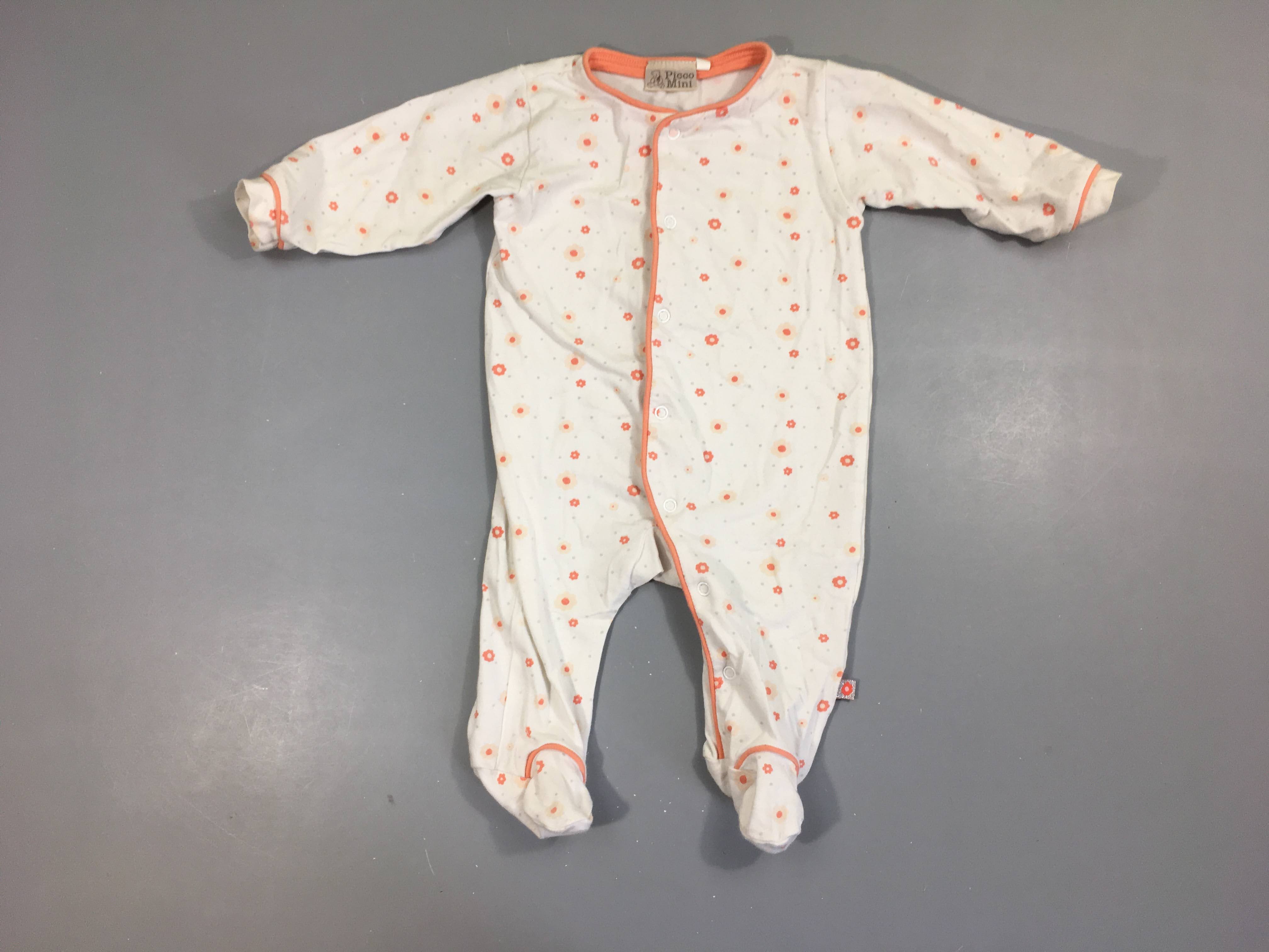 Pyjama jersey blanc fleuri corail, légèrement bouloché