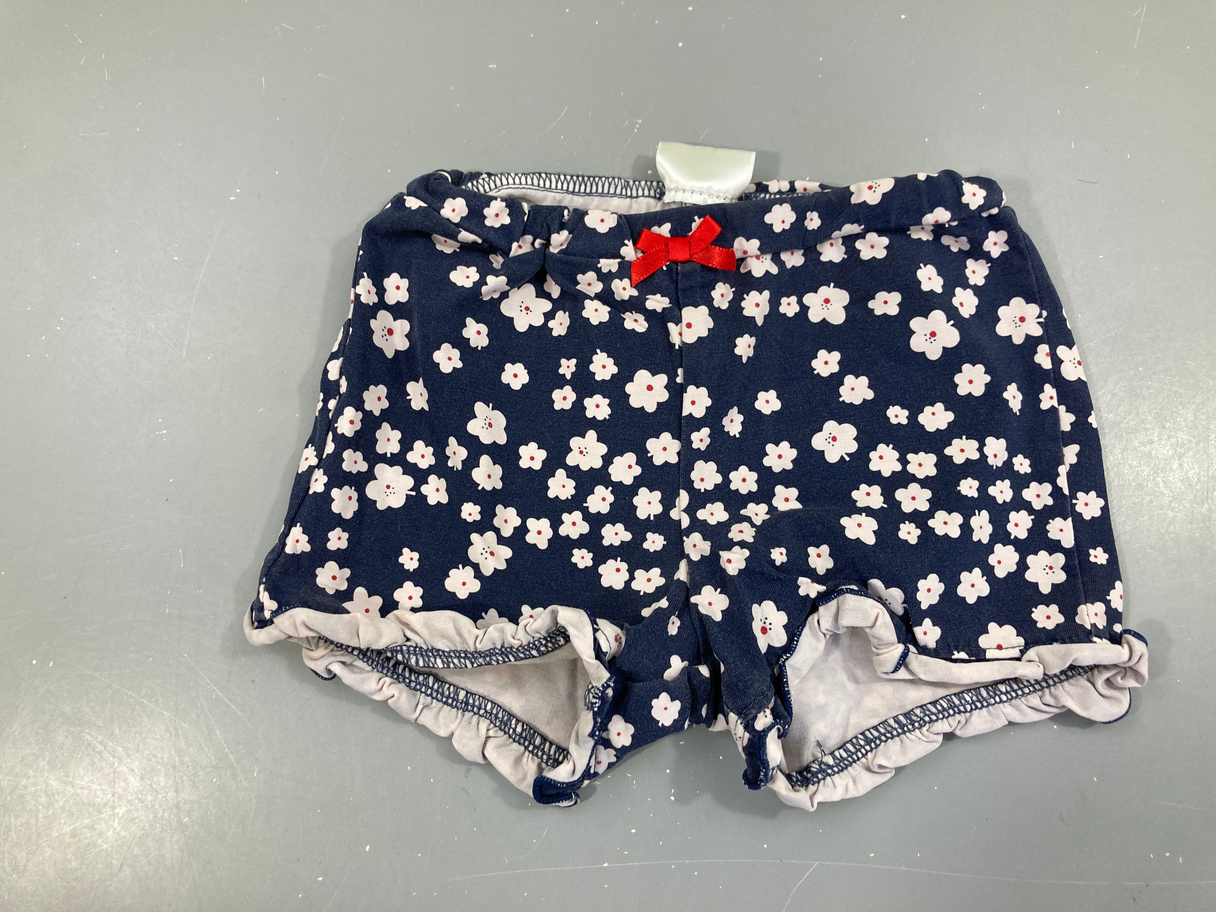 Short jersey bleu foncé fleuri