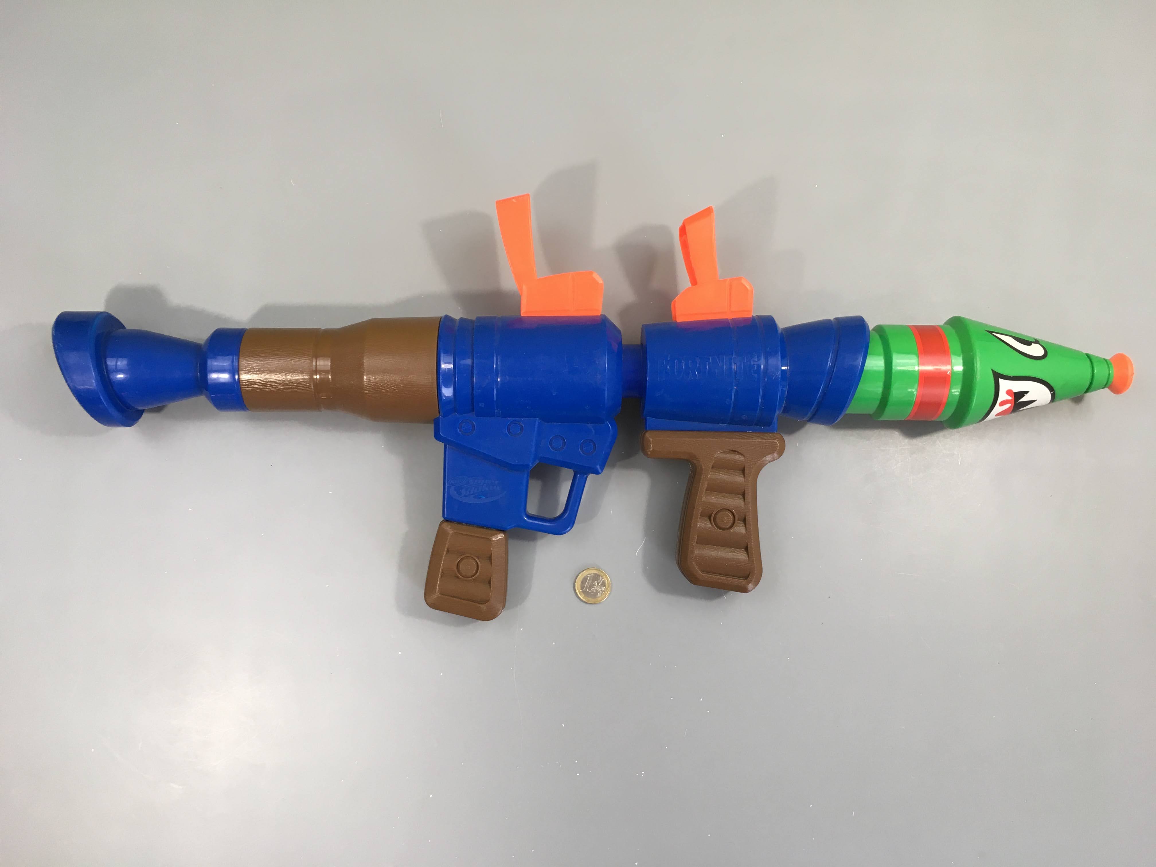 Pistolet Nerf Super Soaker Fornite RL  reserve de 200ml +6a Fonctionne