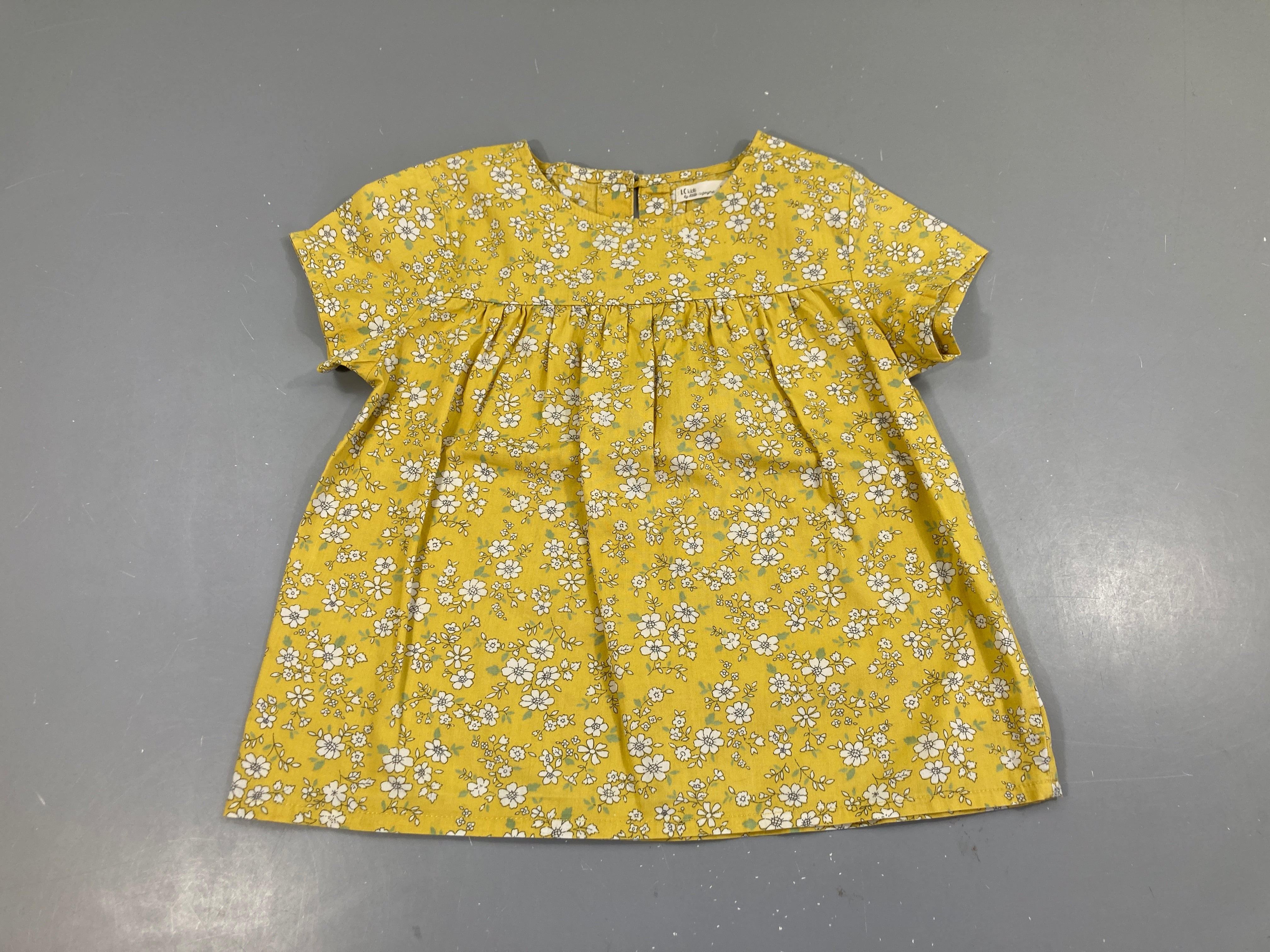 Blouse m.c jaune fleuri