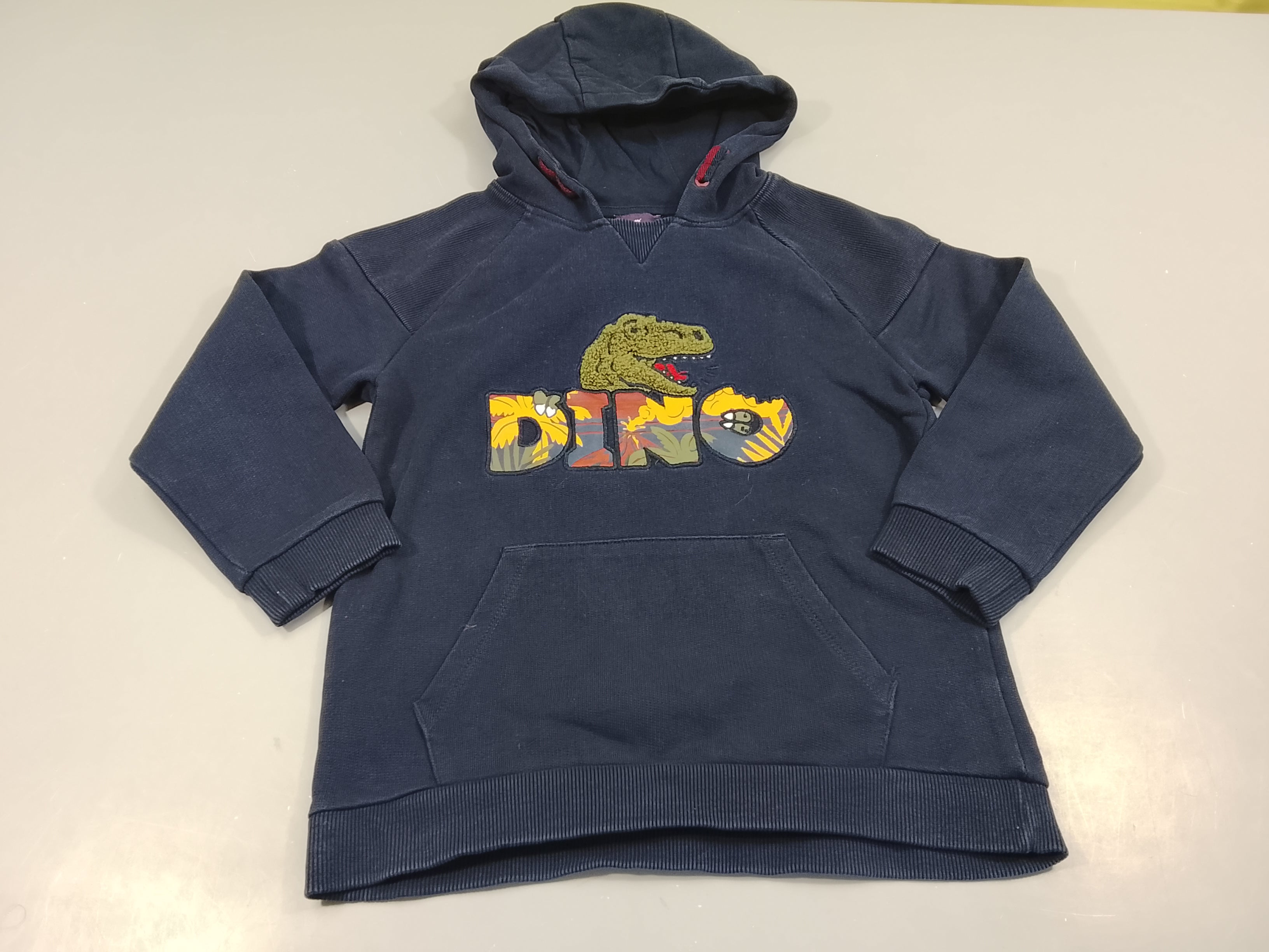 Sweat bleu marine , tête de dinosaure 