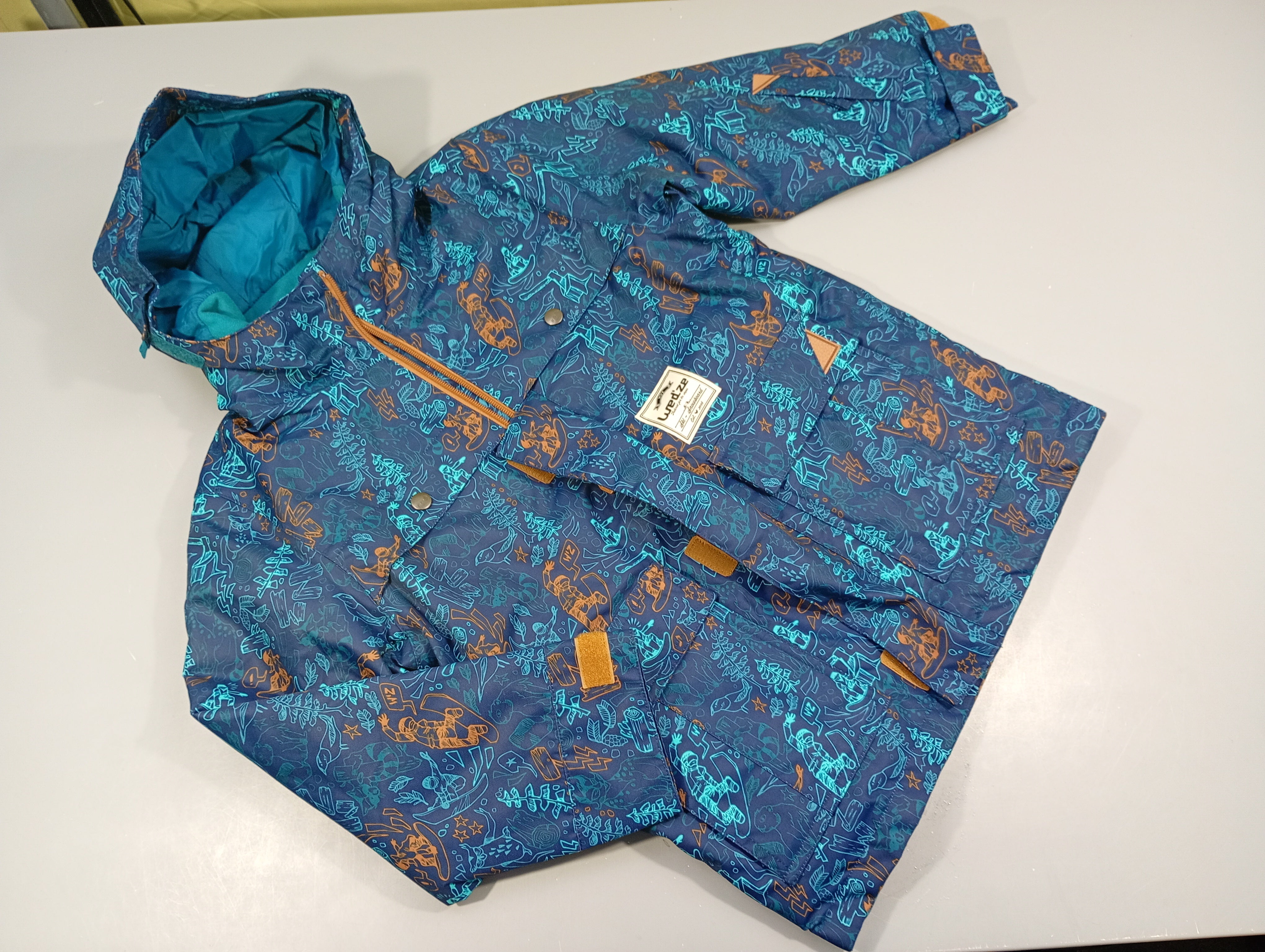 Veste de ski  Wed'ze zippée  à capuche bleue à motifs bleus et bruns