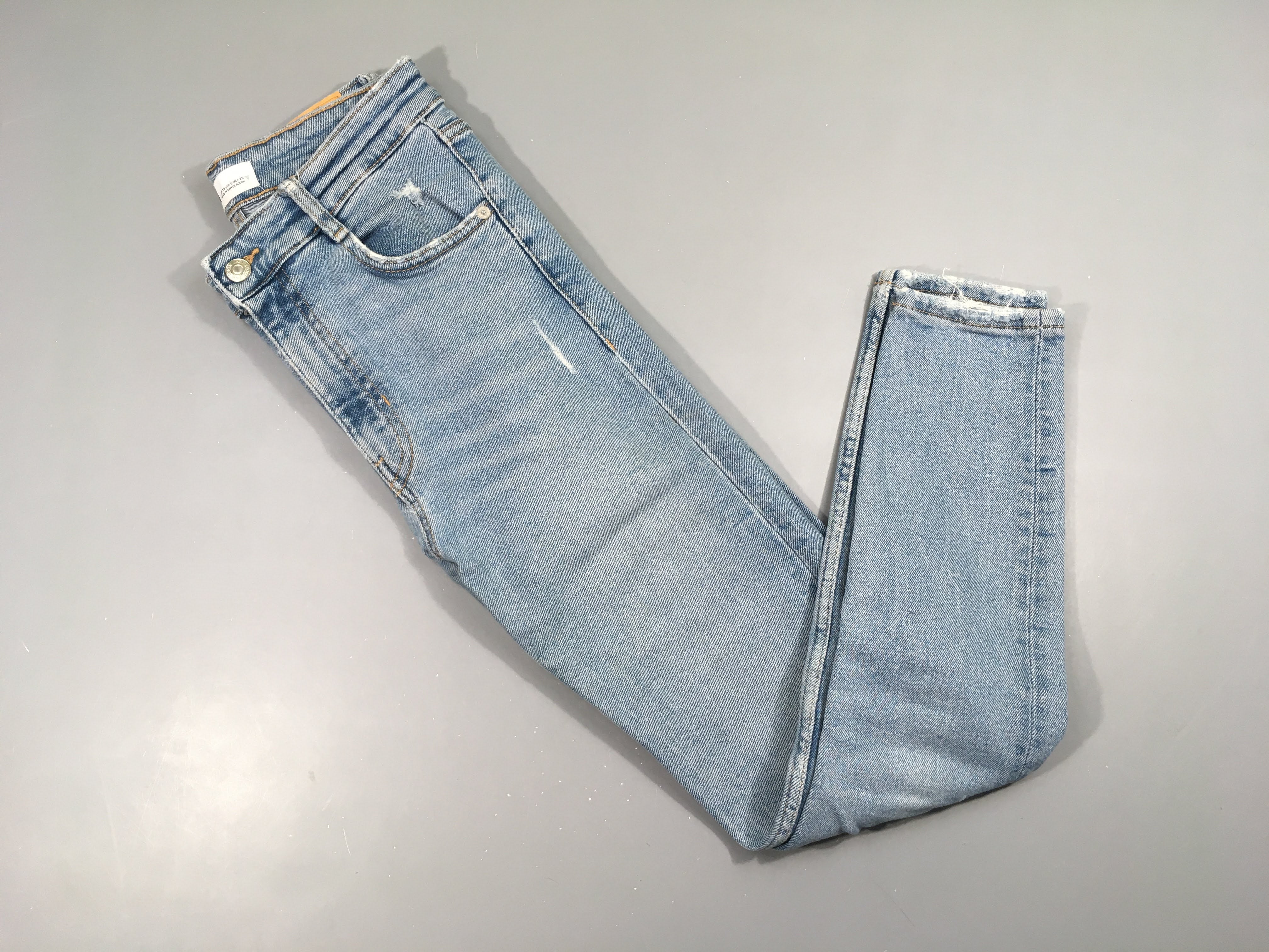 Jeans clair effet effiloché 38
