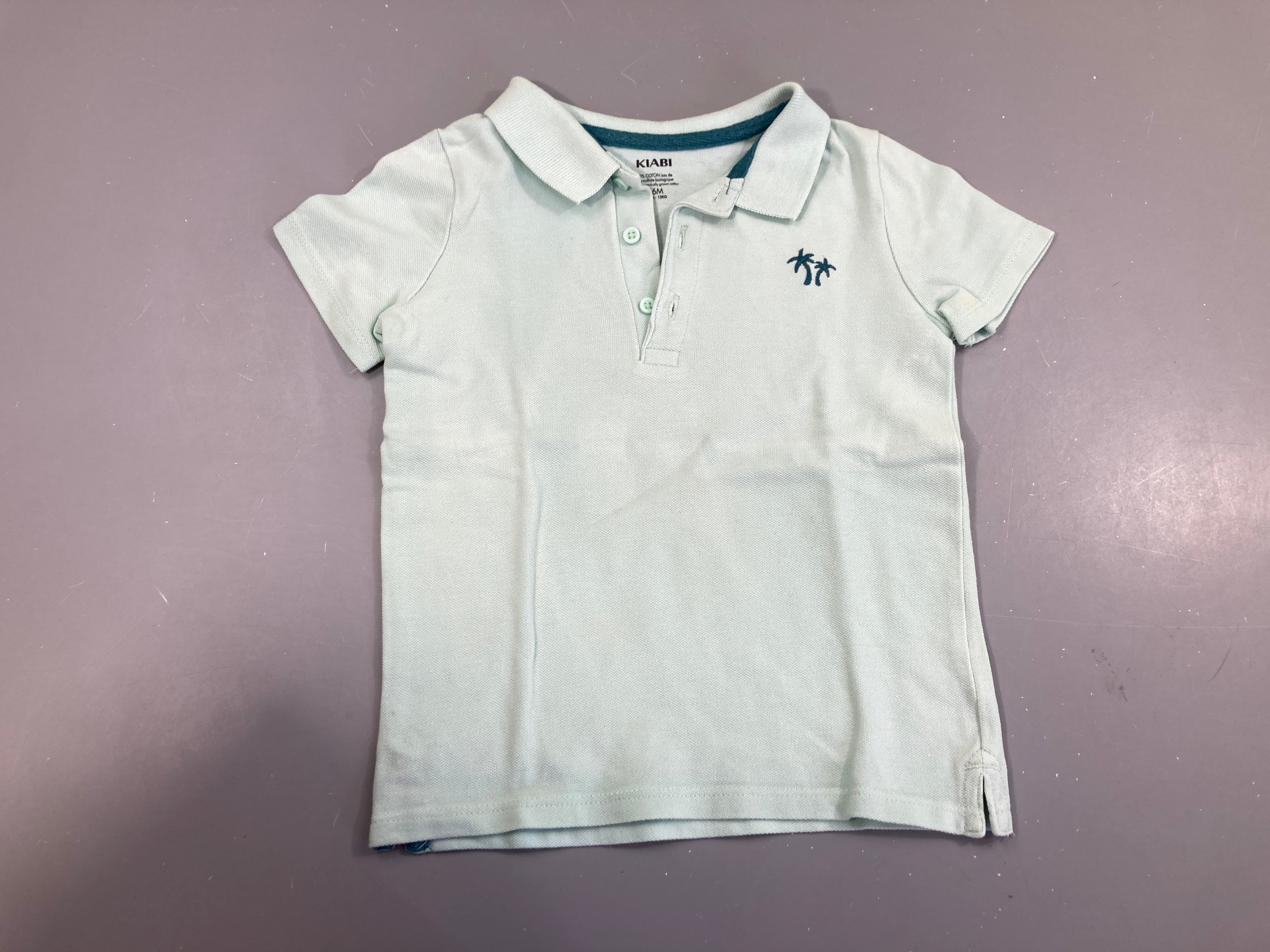 Polo m.c bleu clair palmiers
