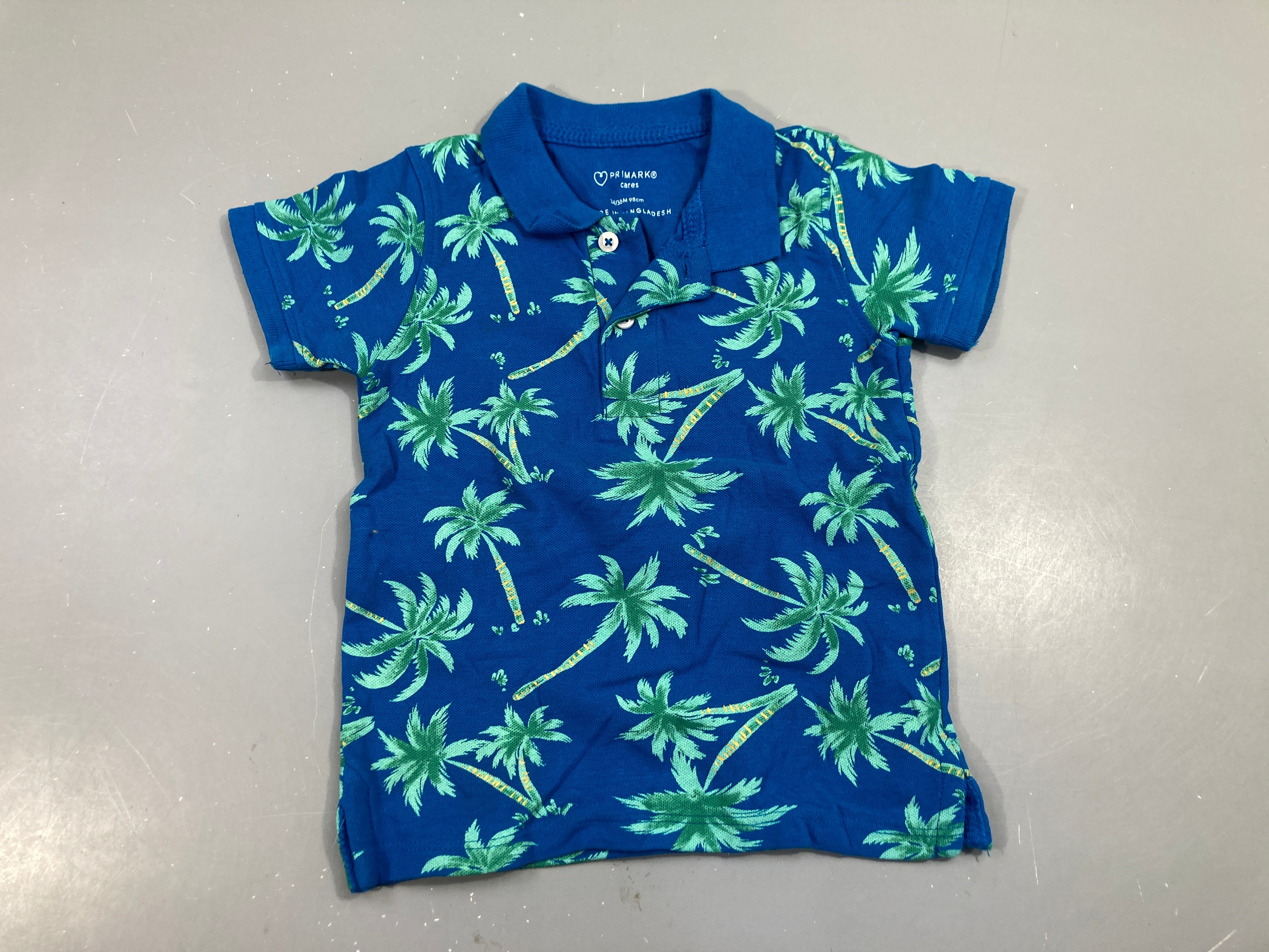 Polo m.c bleu vif avec palmiers