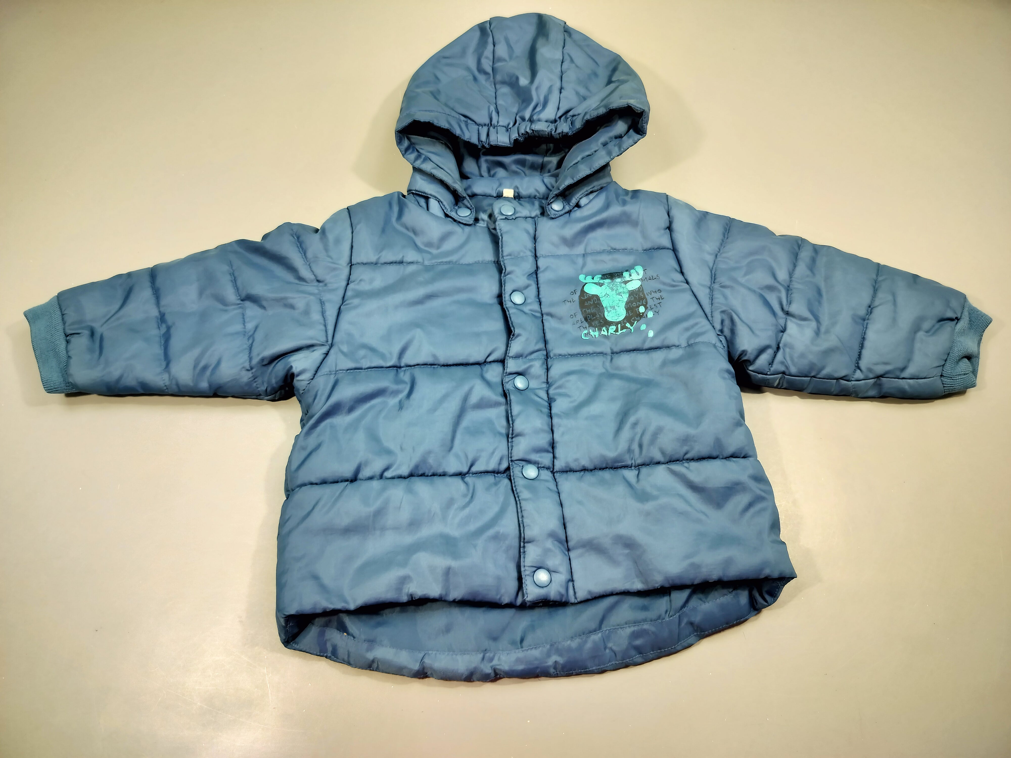 Veste zippée à capuche matelassée bleue, tête de cerf 