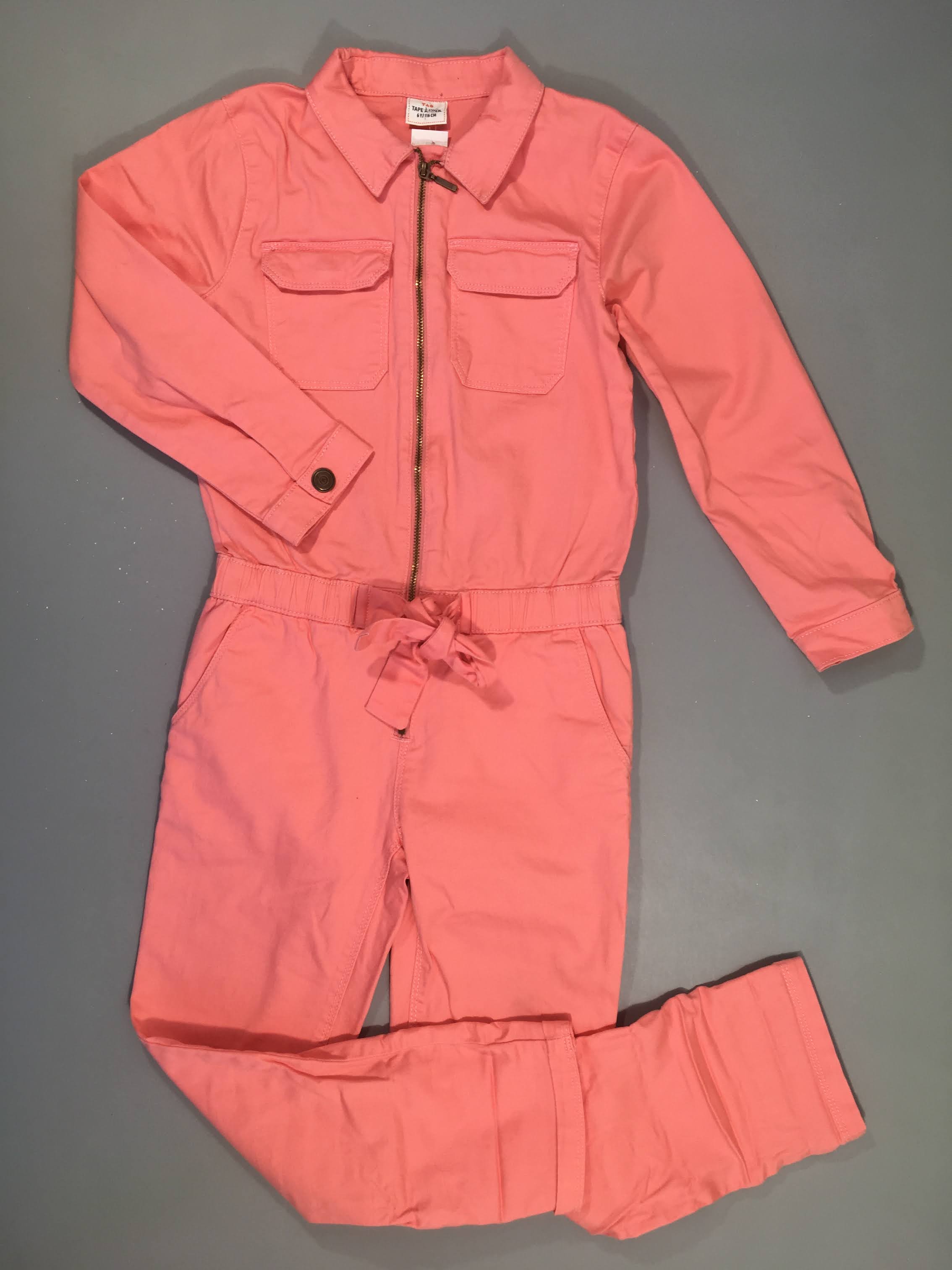 Combinaison m.l zippée rose , tache cuisse gauche