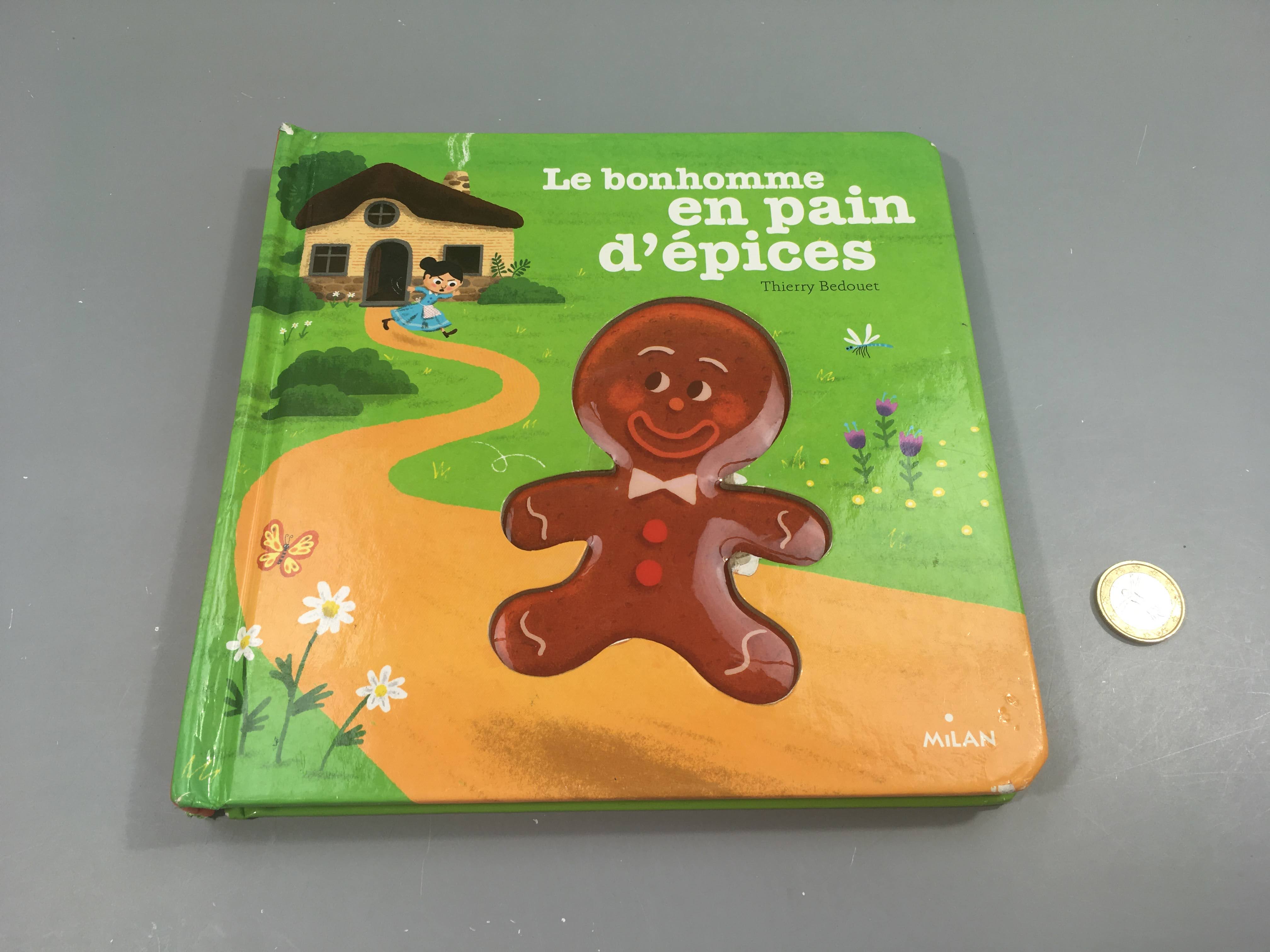 Le bonhomme en pain d'épices-Livre à touche-Coins 1 peu abimés
