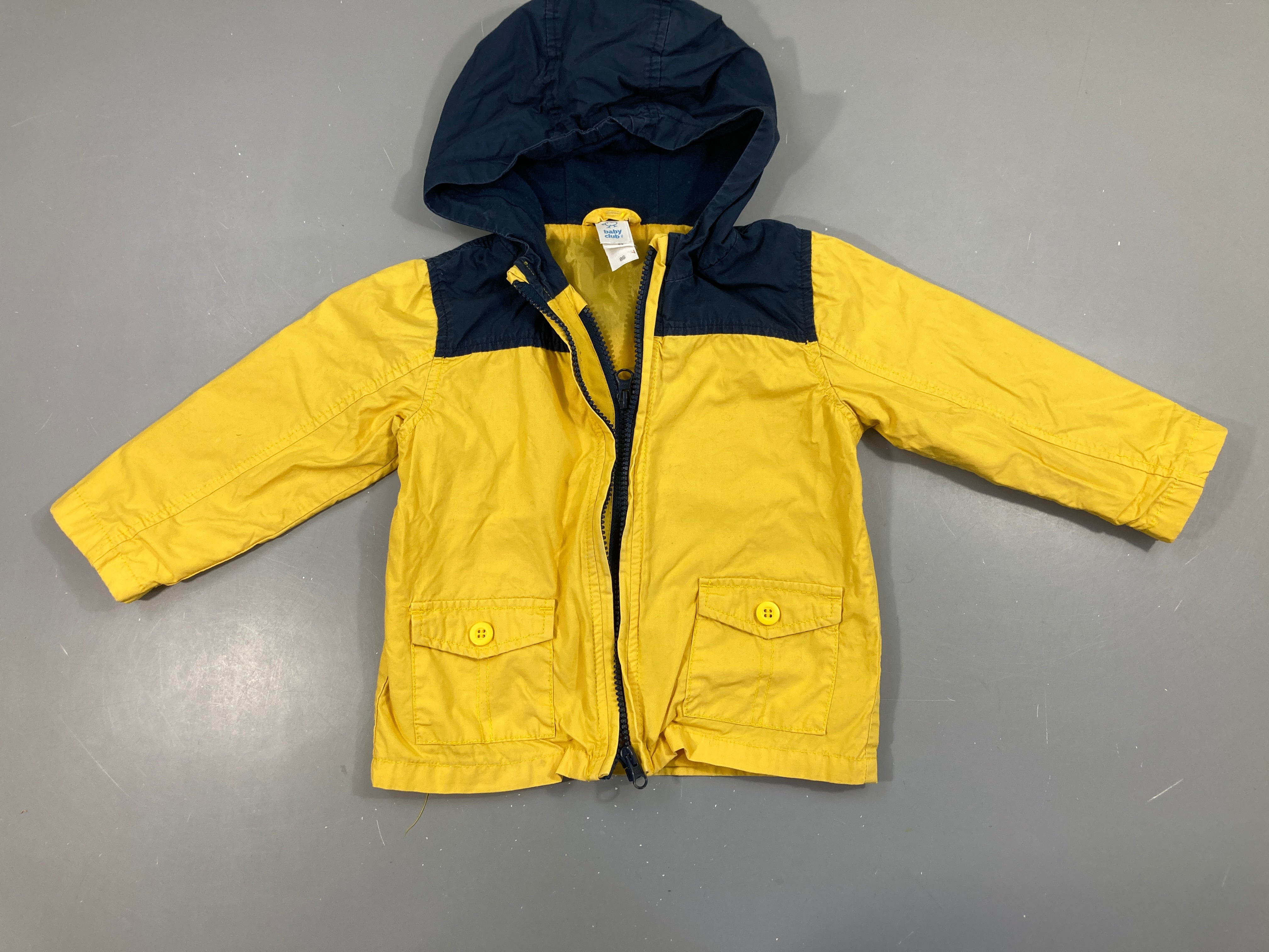 Veste coupe-vent jaune à capuche