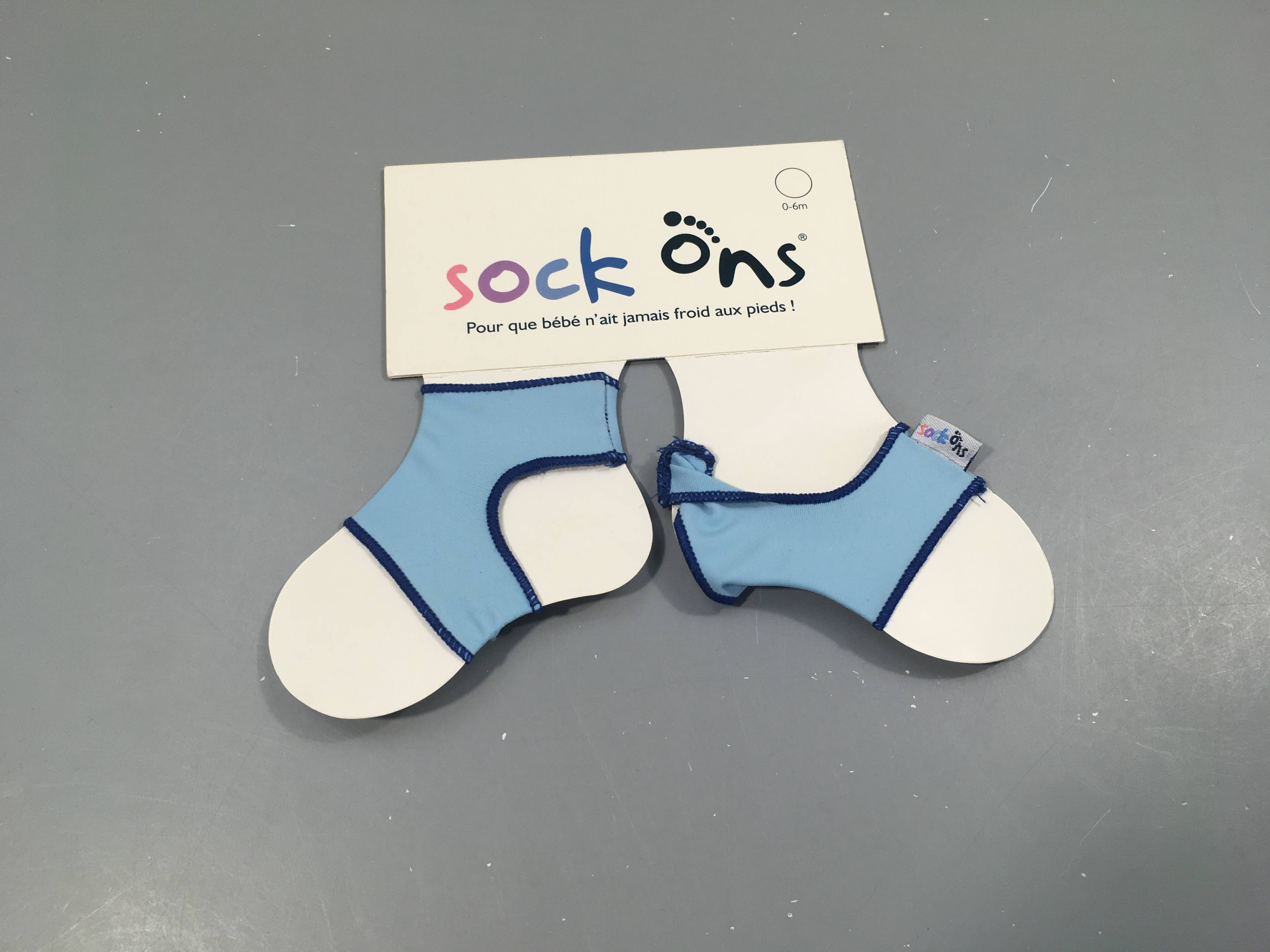 Neuf-Sock Ons-Chaussettes ouvertes se plaçant autour des chaussettes de bébé les empêchant de s'enlever.