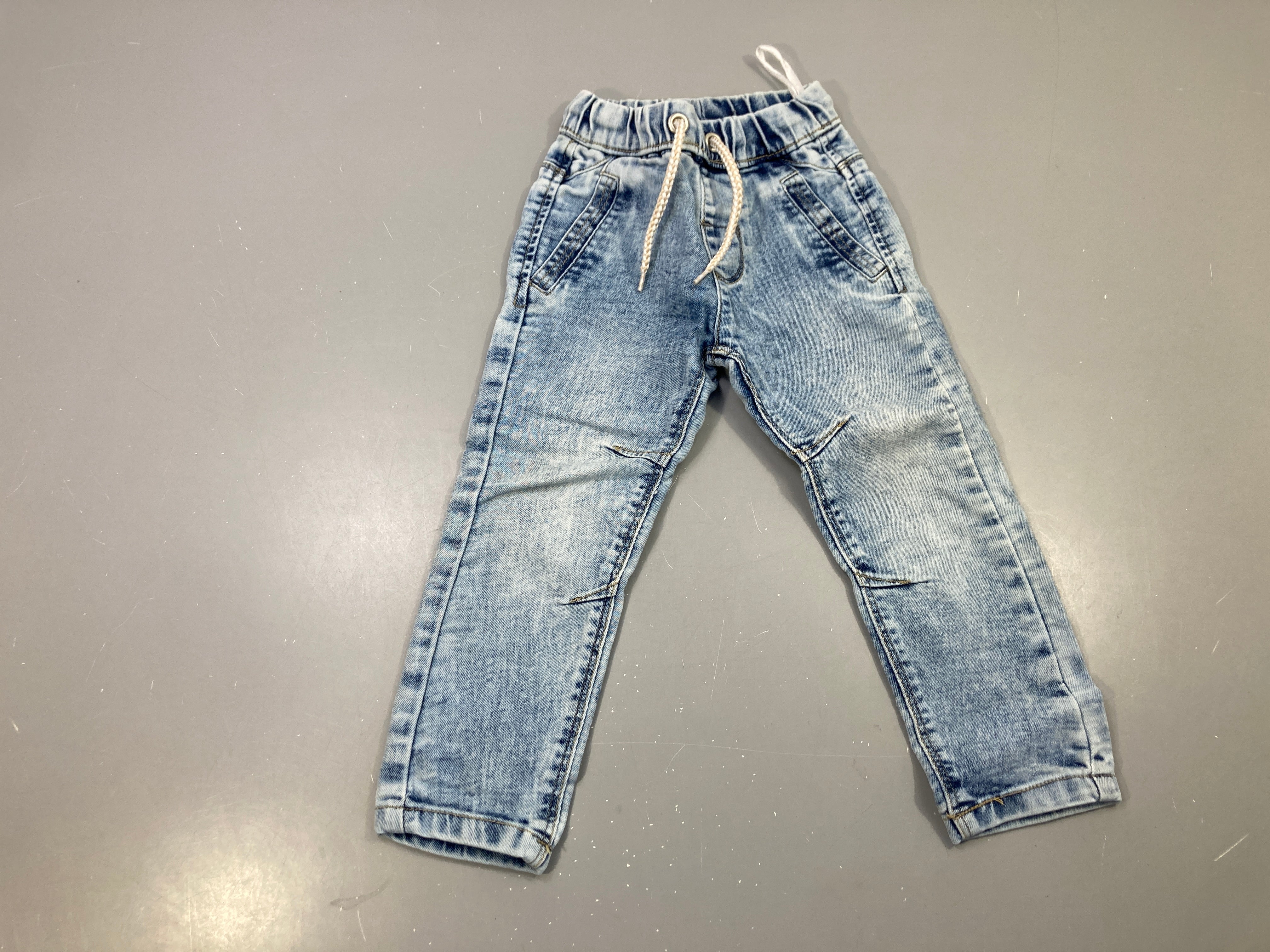 Pantalon jean bleu clair délavé, taille élastique cordon