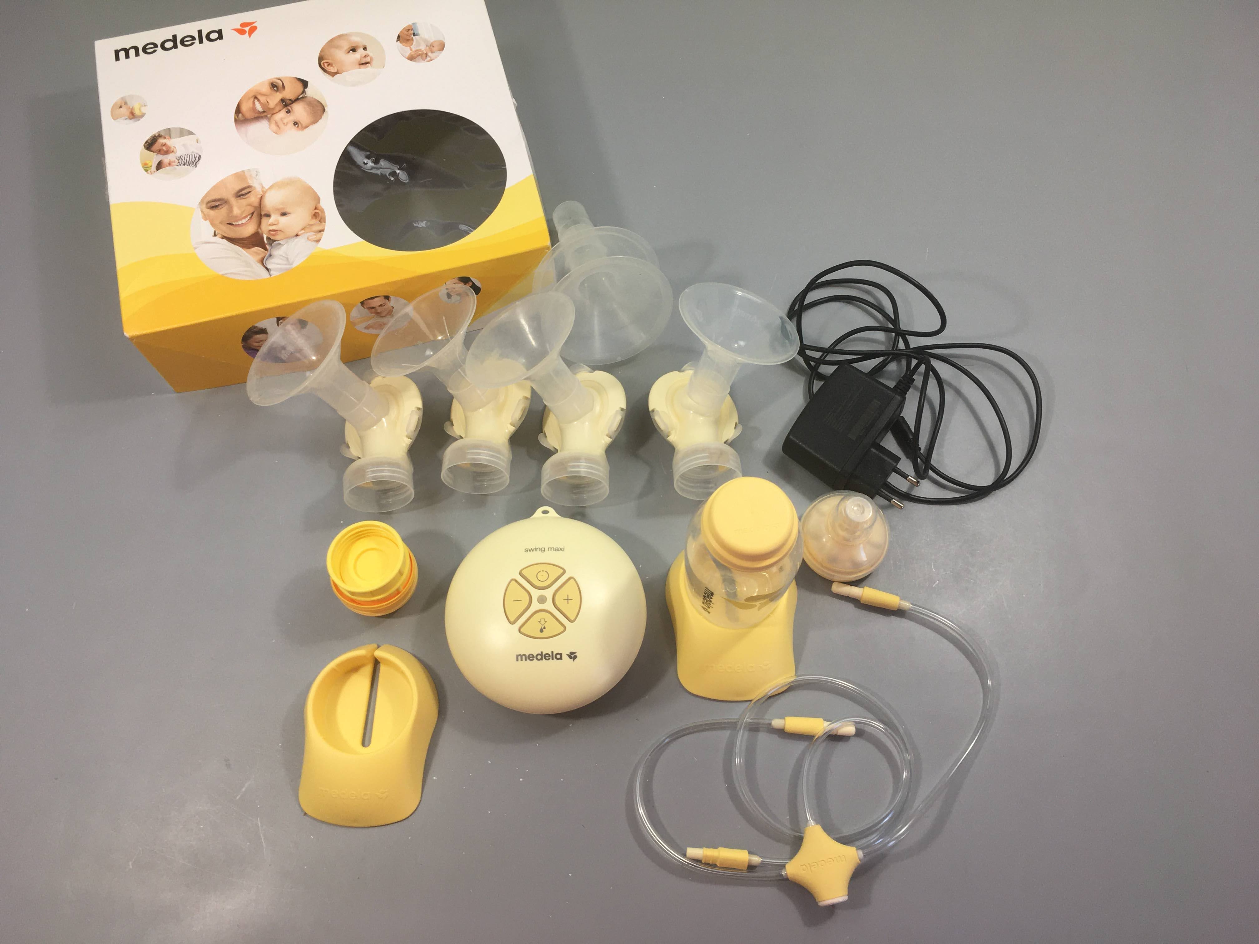 tire lait double medela swing maxi, manque 1 biberon + 2 embouts 24 et 27mm