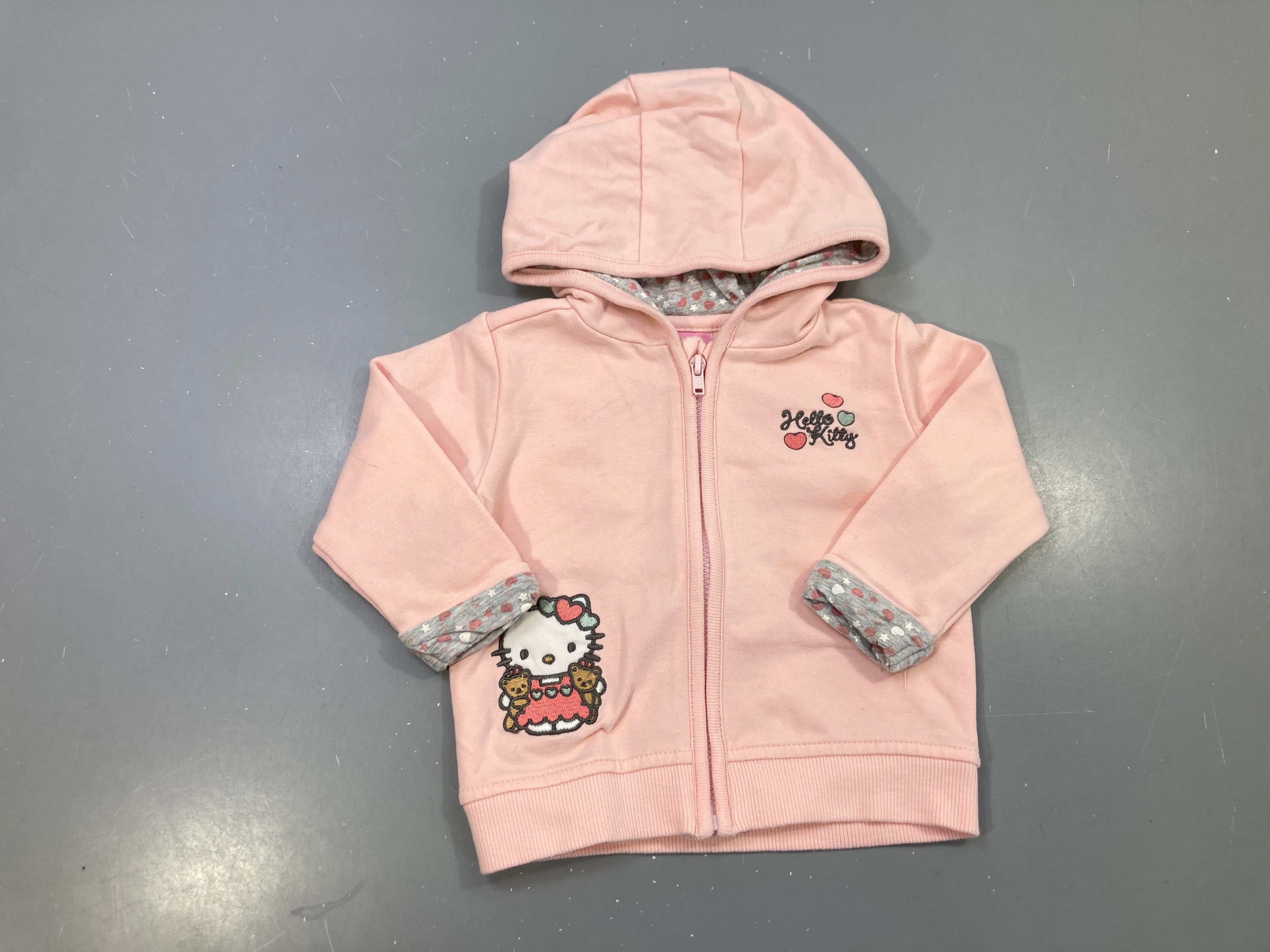 Sweat zippé capuche rose Hello Kitty, revers gris coeurs