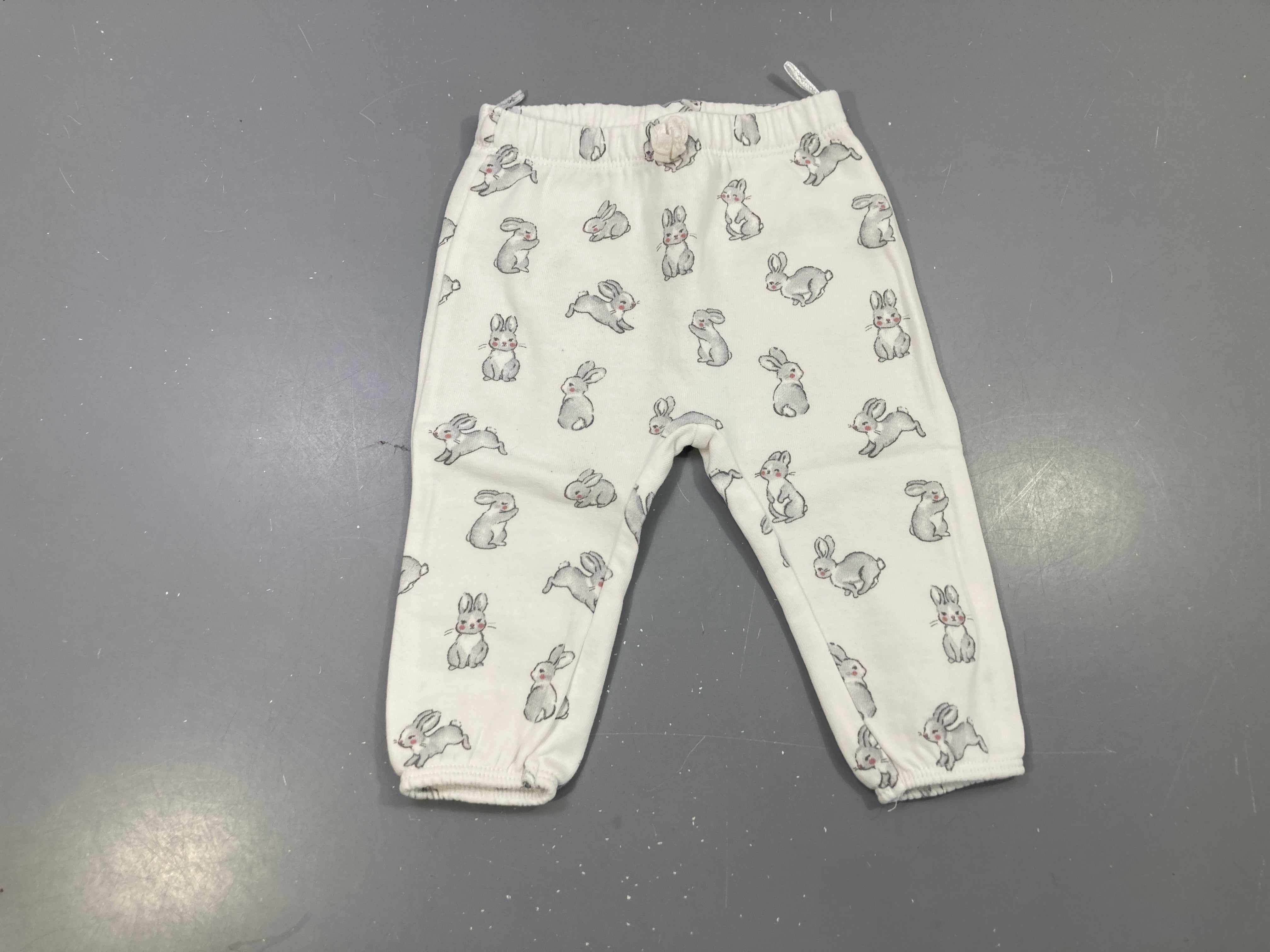 Pantalon molleton écru lapins gris