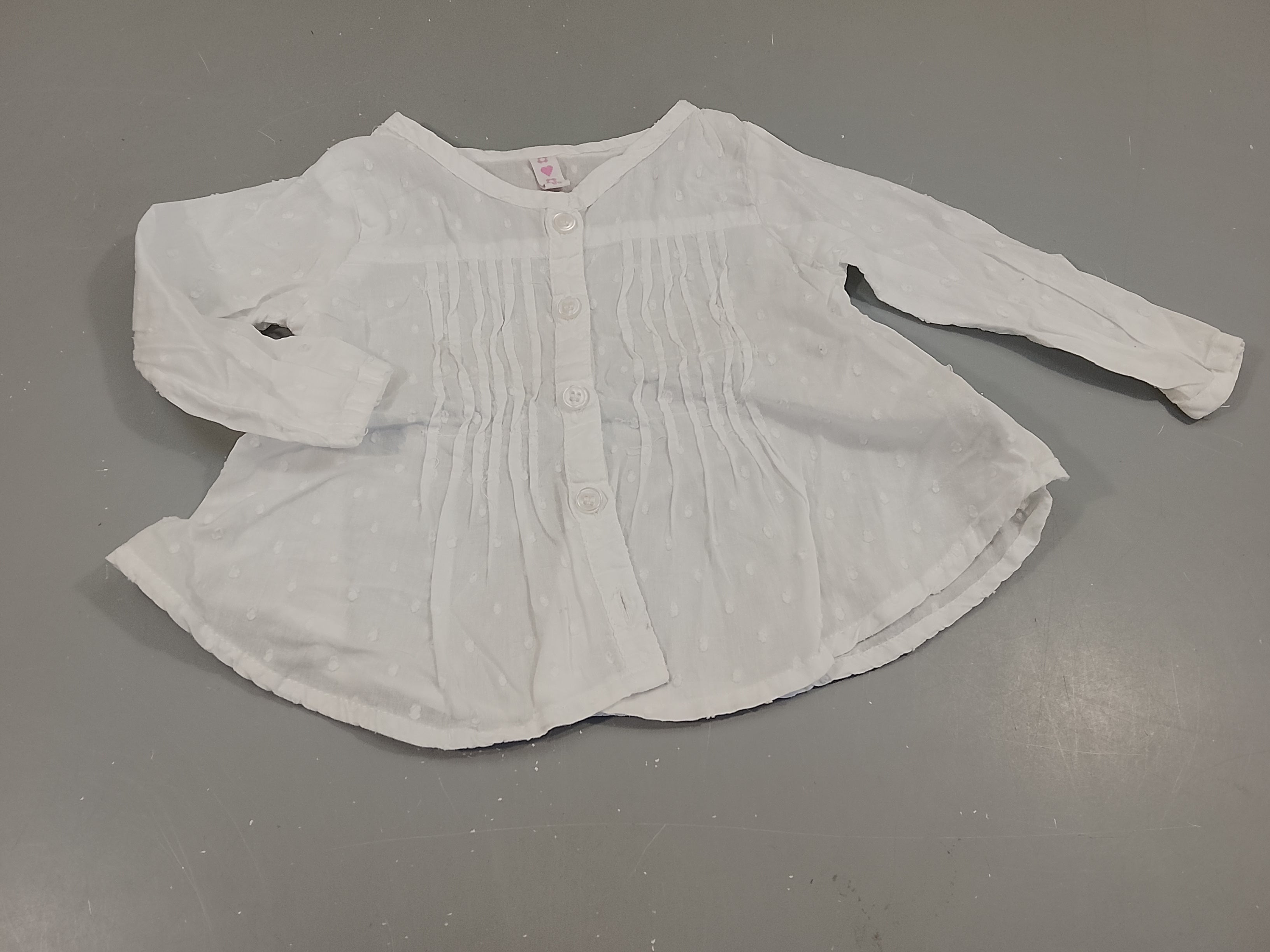 Blouse m.l blanche boutonnée