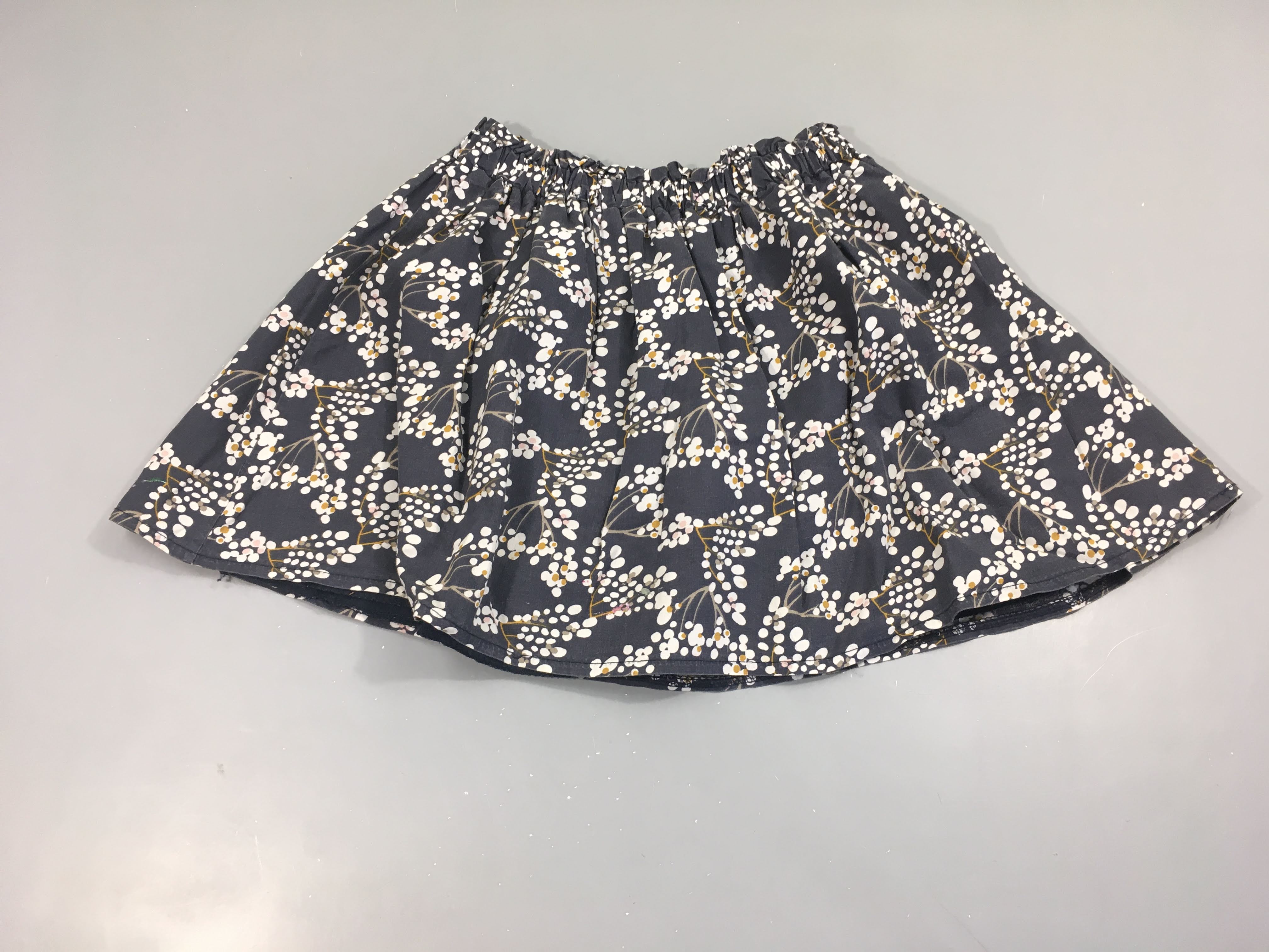 Jupe bleue fleurie blanc doublée Little cigogne