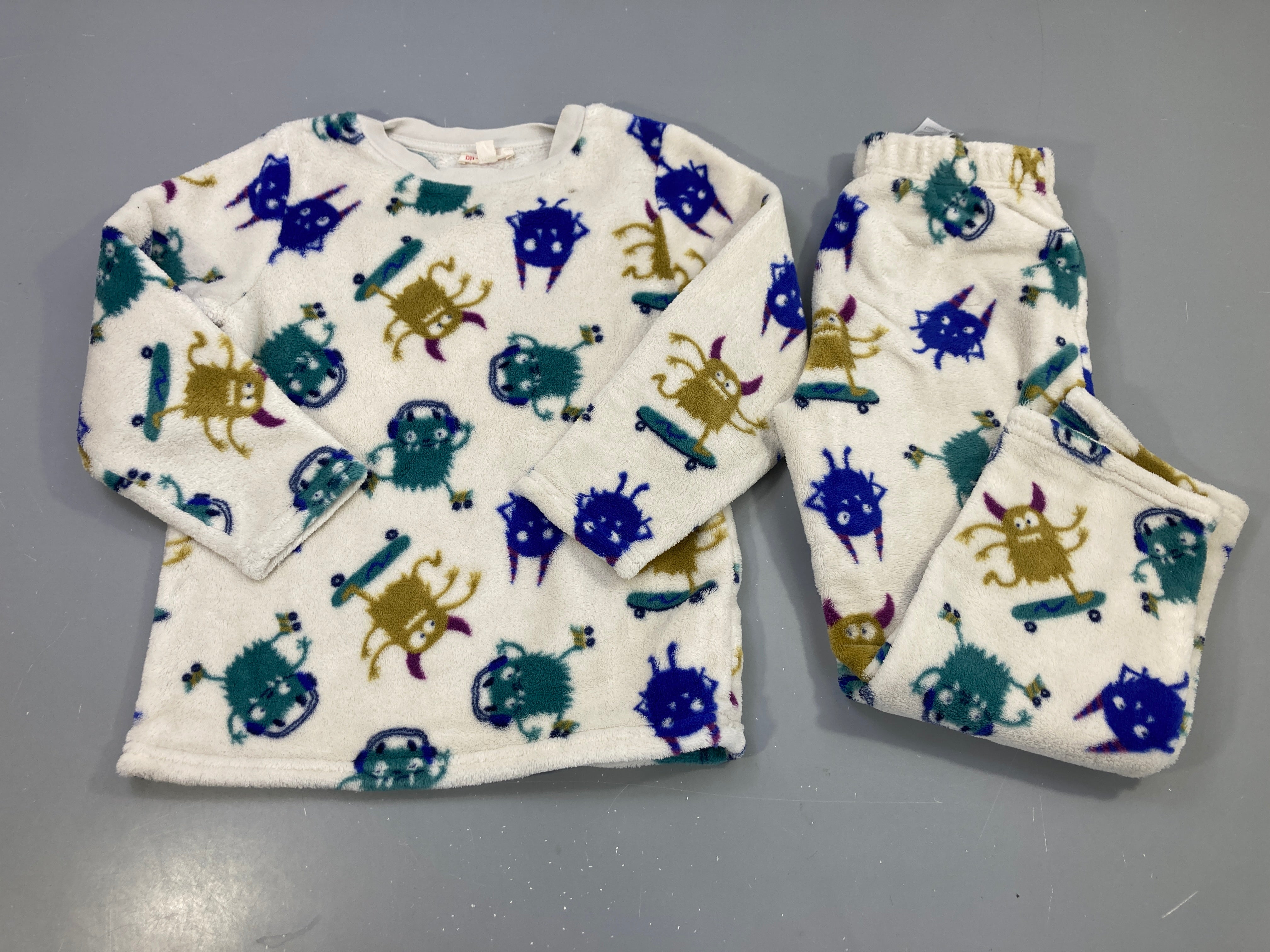 Pyjama 2pcs polaire écru monstres multicolores skate