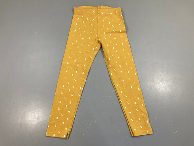 Legging jaune fleurs, légèrement bouloché, moins cher chez Petit Kiwi