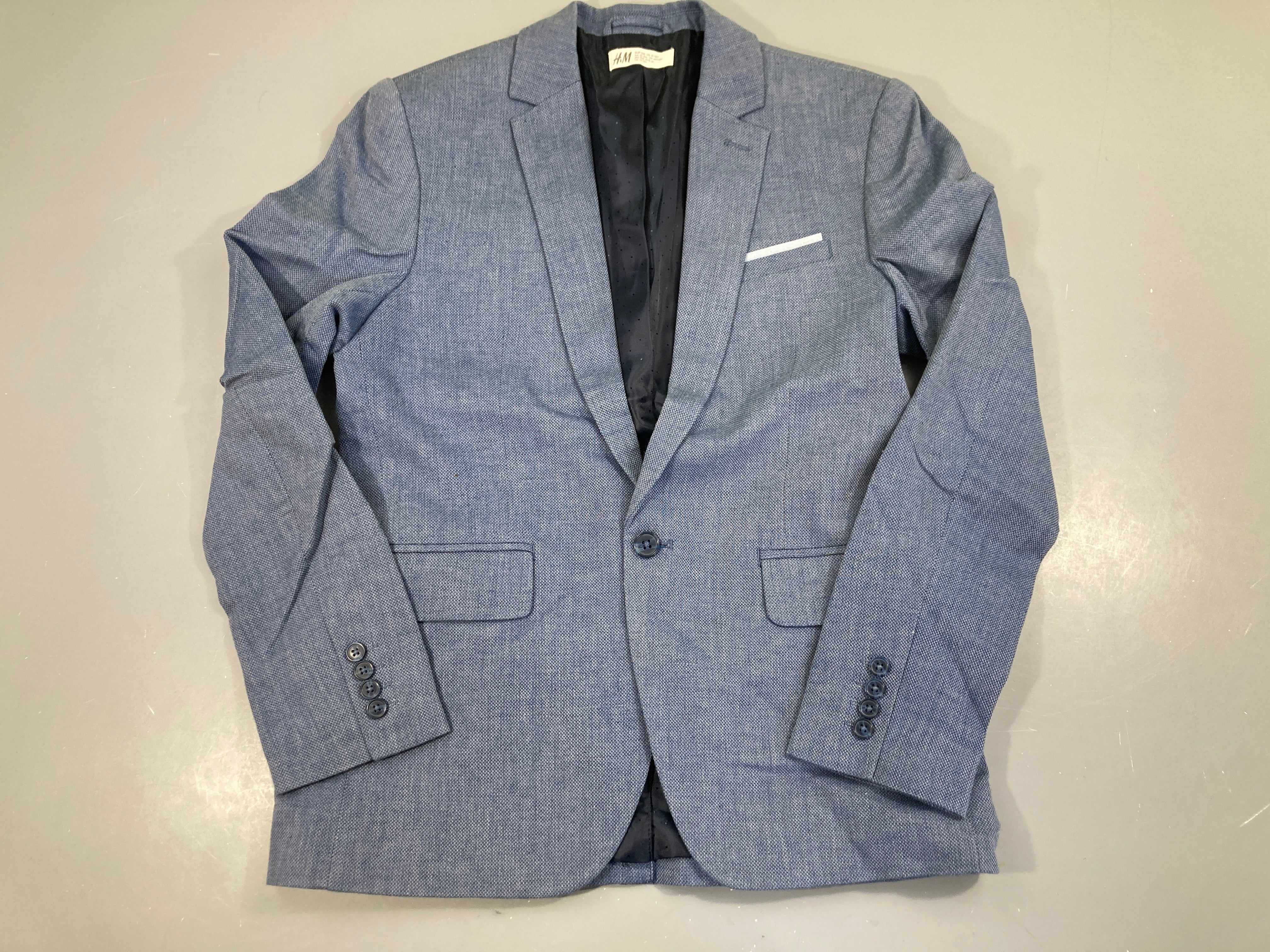 Veste de costume bleu avec épaulettes