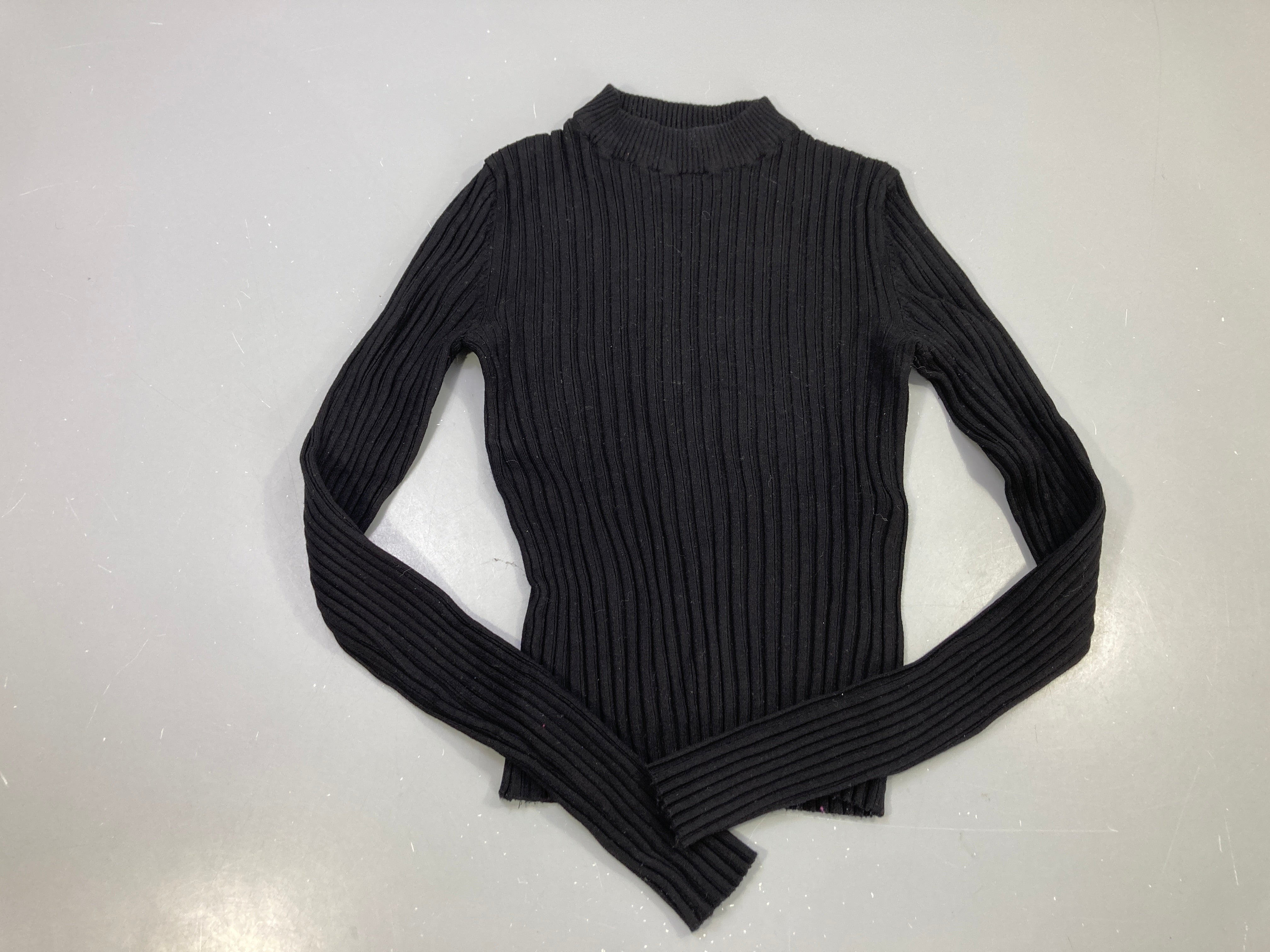 Pull col montant noir maille côtelée