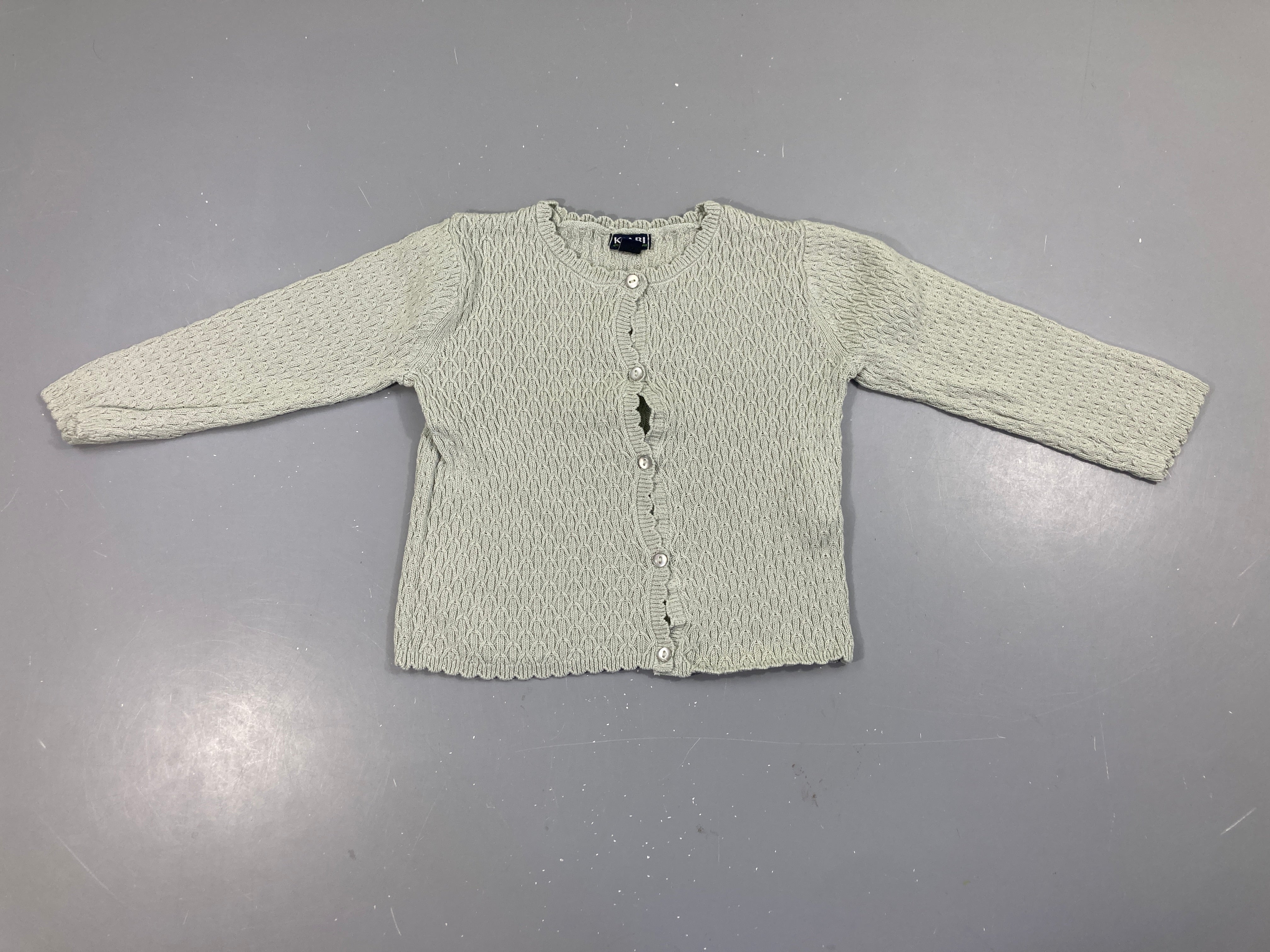 Gilet texturé vert pâle