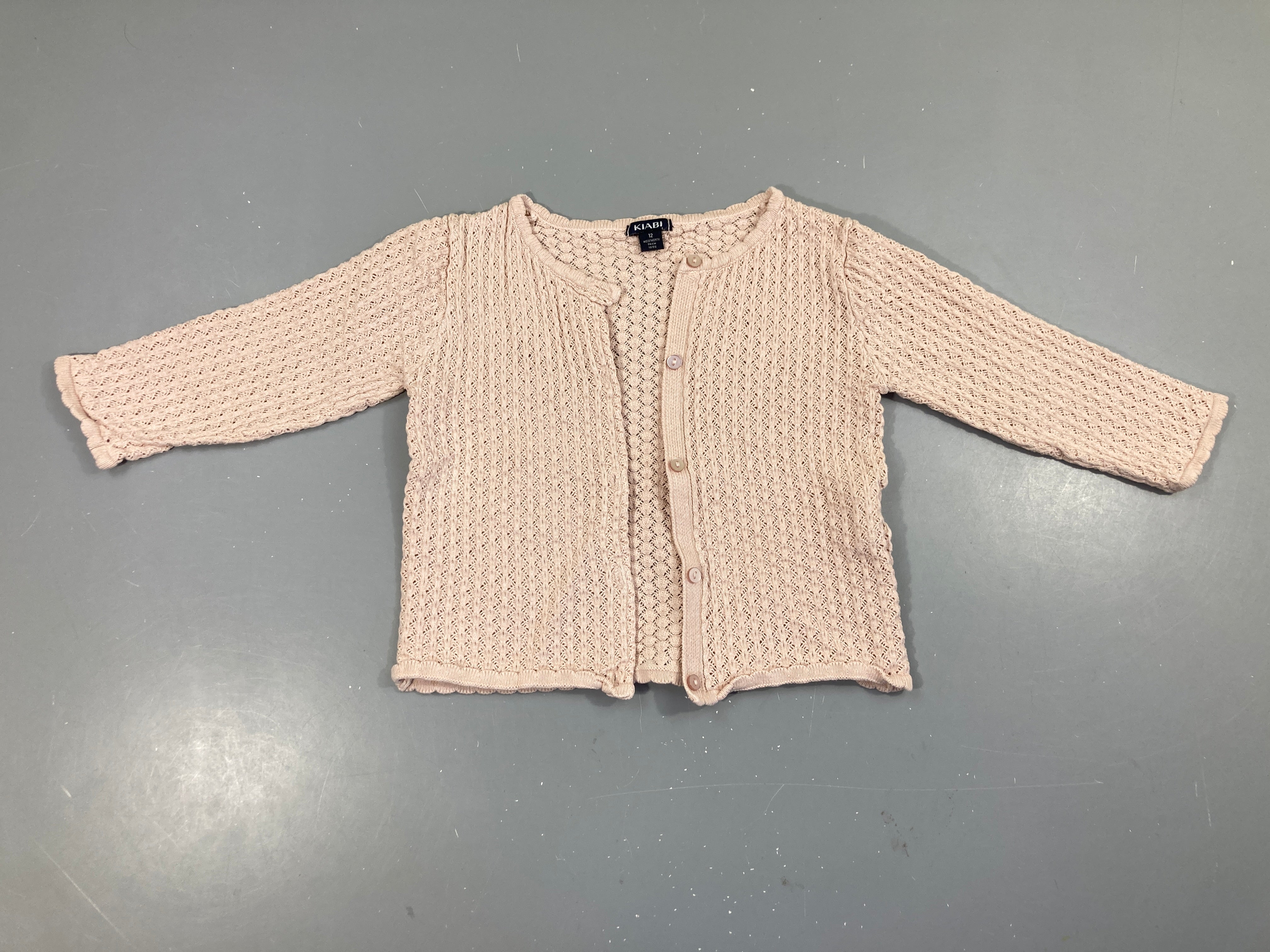 Gilet ajouré rose pâle