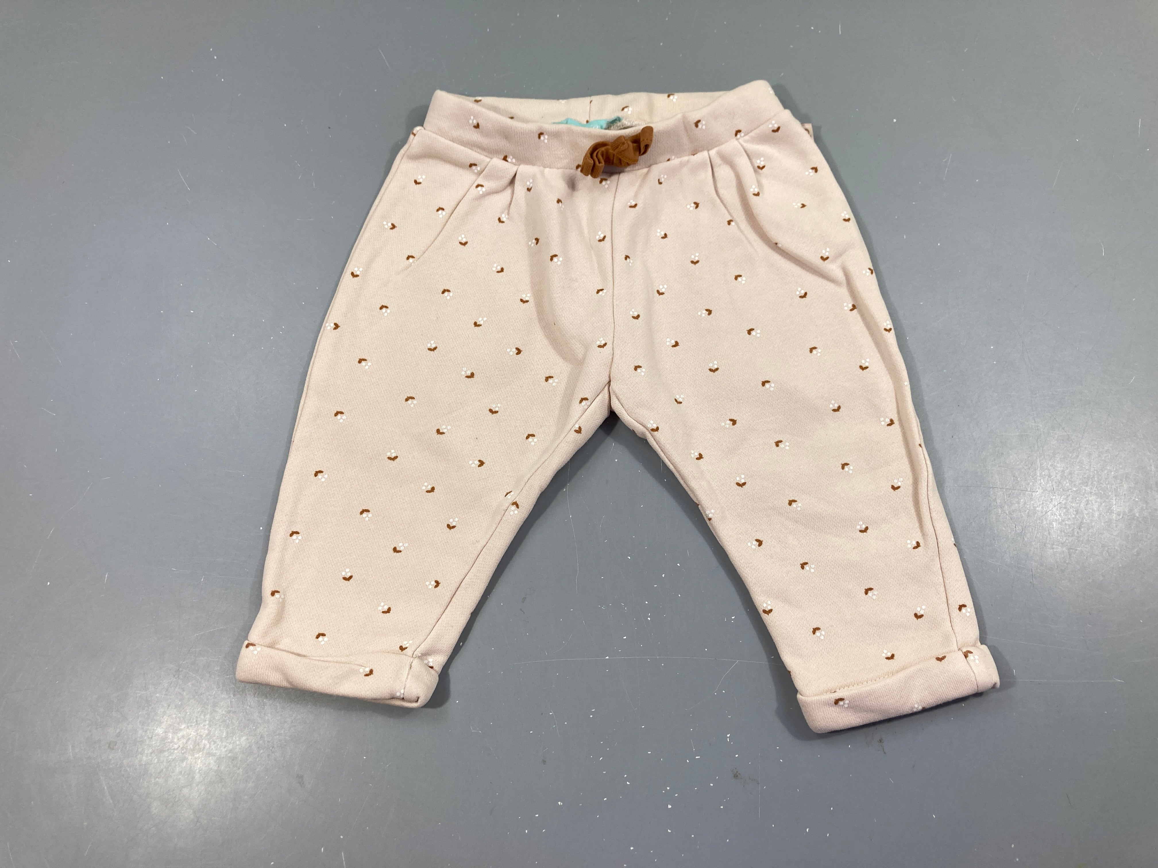 Pantalon molleton beige fleuri