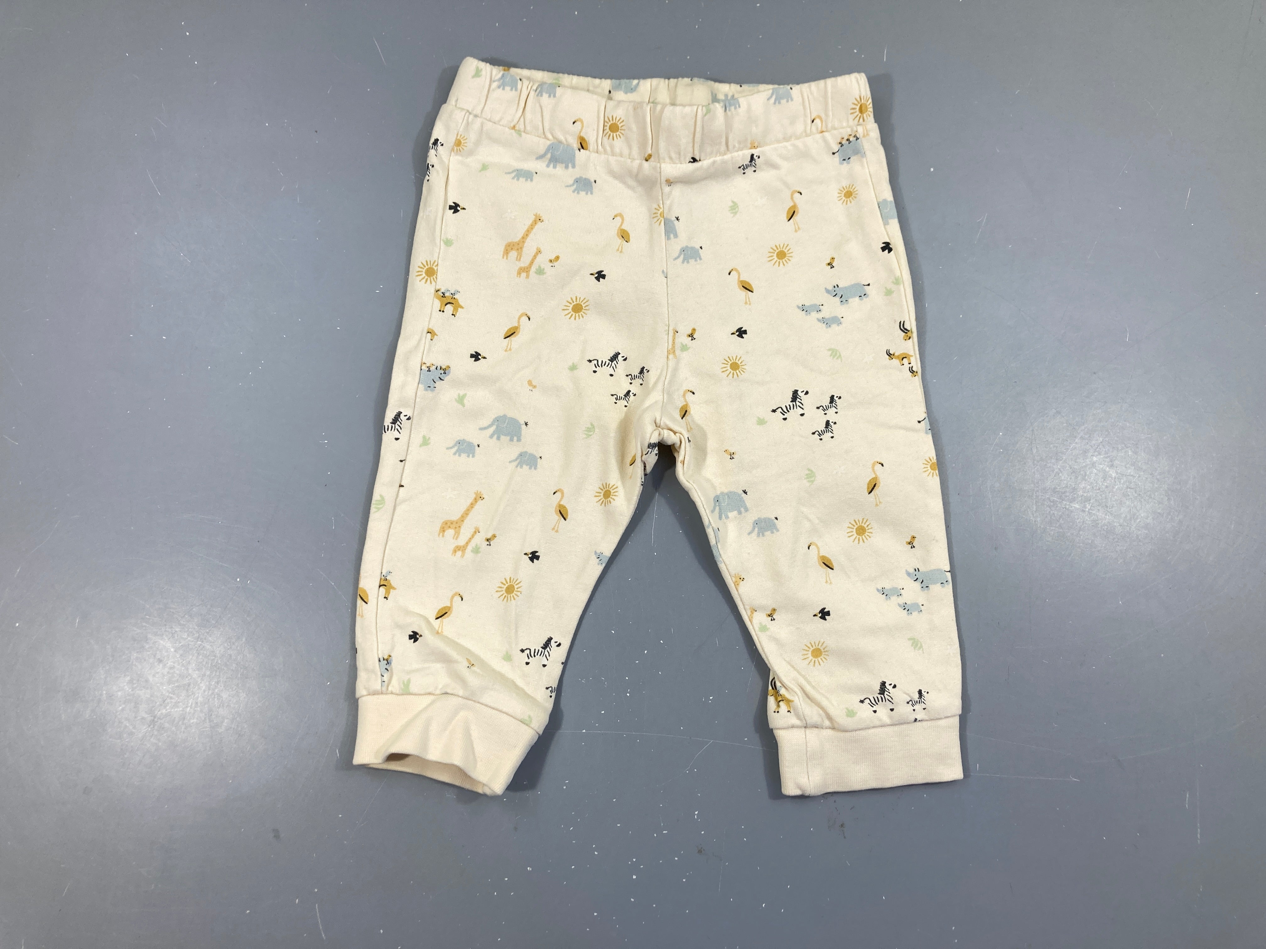 Pantalon molleton écru animaux