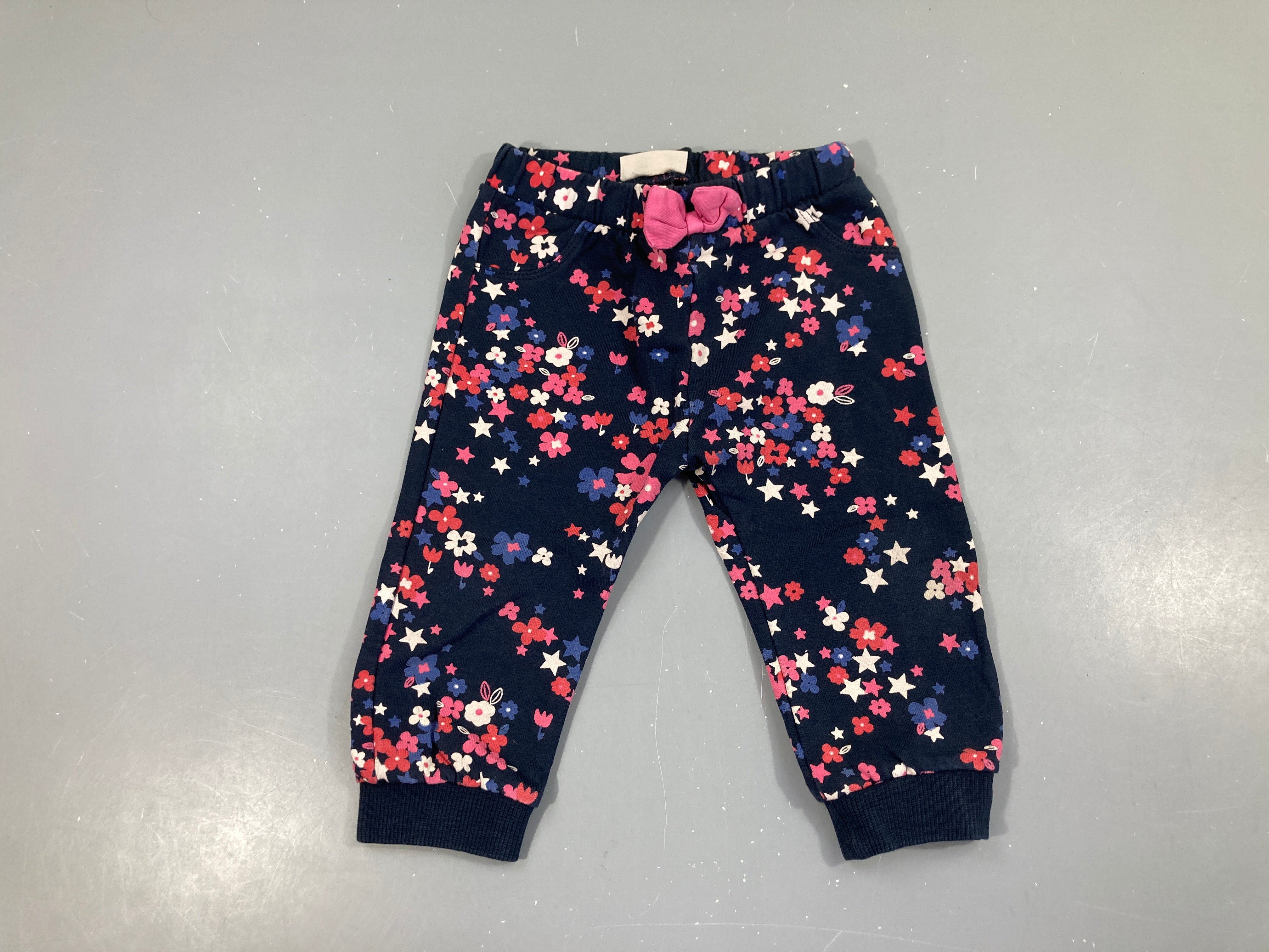 Pantalon molleton bleu foncé étoiles/fleurs taille et chevilles élastiques