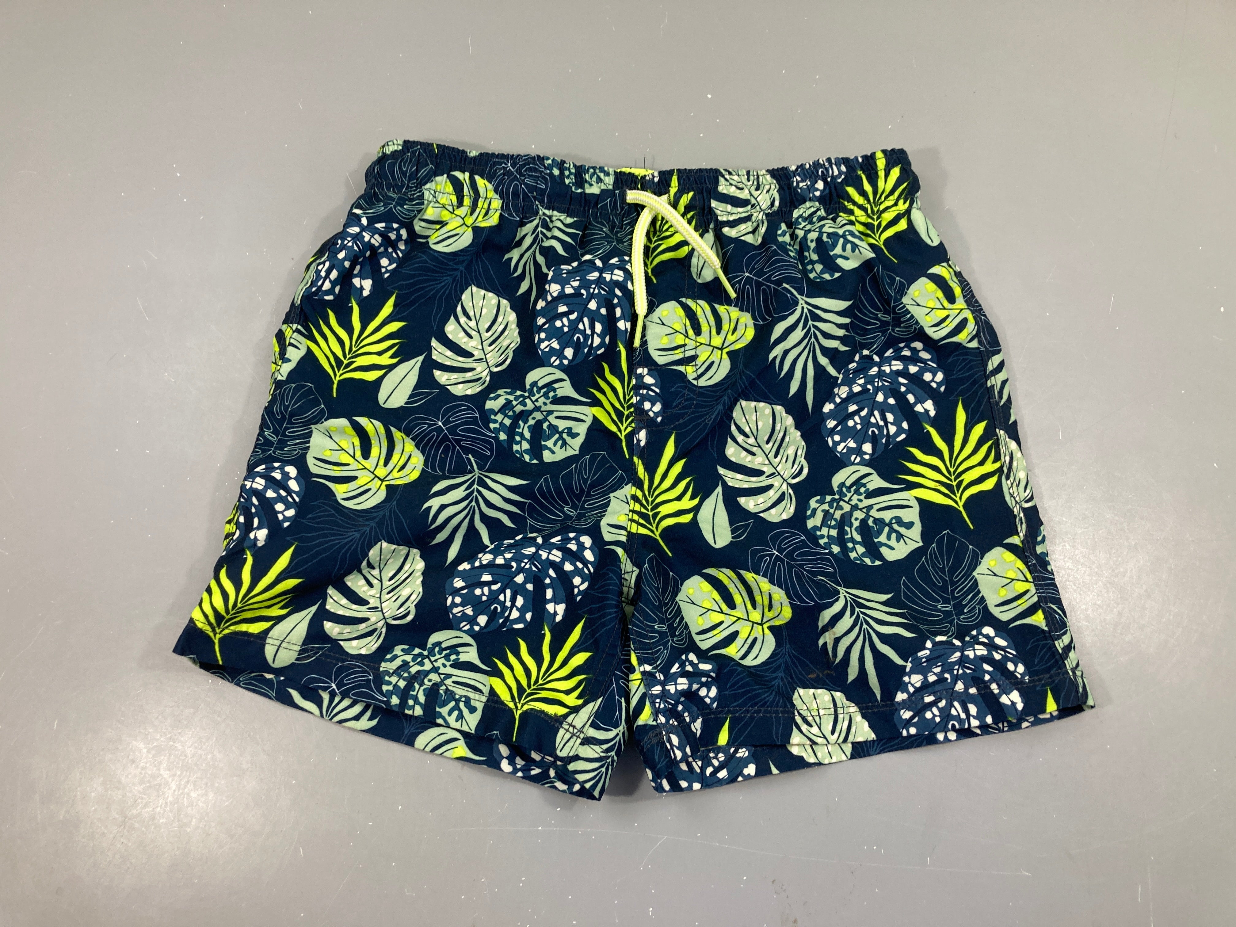 Maillot short bleu marine feuilles